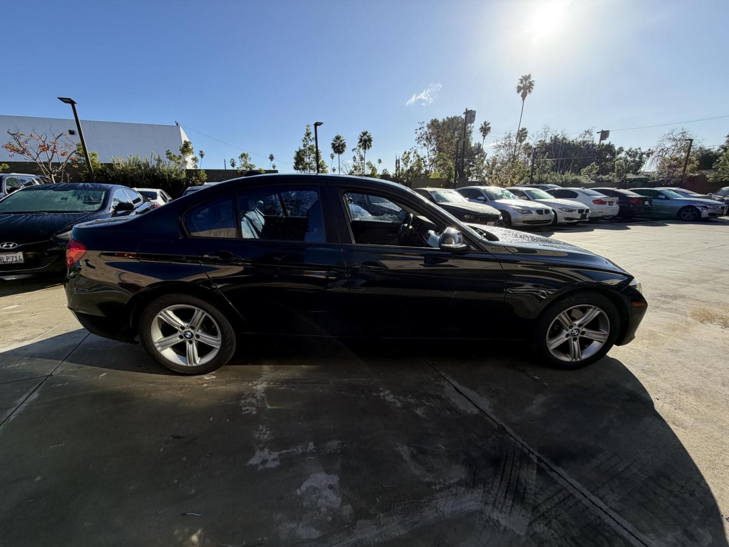 2012 BLACK /Black BMW 3-Series 328i Sedan (WBA3C1C51CF) with an 2.0L L4 DOHC 16V engine, located at 30 S. Berkeley Avenue, Pasadena, CA, 91107, (626) 248-7567, 34.145447, -118.109398 - This BMW 3 Series sedan offers the perfect blend of performance, comfort, and everyday usability. With only 82,000 miles, it has significantly lower mileage than average for its year, making it a smart option for buyers who want a well-maintained luxury vehicle. Highlights commonly associated wit - Photo#5