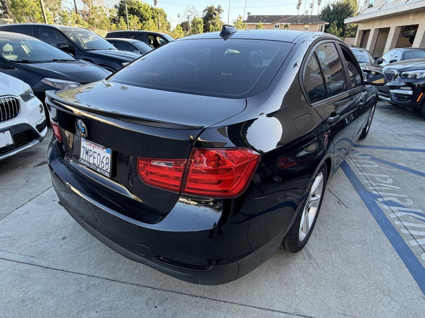 2012 BLACK /Black BMW 3-Series 328i Sedan (WBA3C1C51CF) with an 2.0L L4 DOHC 16V engine, located at 30 S. Berkeley Avenue, Pasadena, CA, 91107, (626) 248-7567, 34.145447, -118.109398 - This BMW 3 Series sedan offers the perfect blend of performance, comfort, and everyday usability. With only 82,000 miles, it has significantly lower mileage than average for its year, making it a smart option for buyers who want a well-maintained luxury vehicle. Highlights commonly associated wit - Photo#12