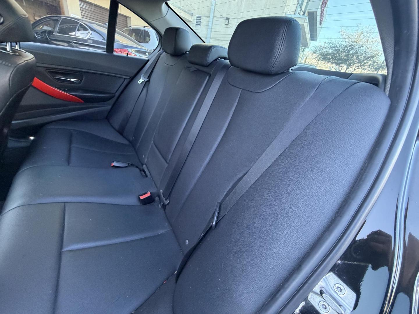 2012 BLACK /Black BMW 3-Series 328i Sedan (WBA3C1C51CF) with an 2.0L L4 DOHC 16V engine, located at 30 S. Berkeley Avenue, Pasadena, CA, 91107, (626) 248-7567, 34.145447, -118.109398 - This BMW 3 Series sedan offers the perfect blend of performance, comfort, and everyday usability. With only 82,000 miles, it has significantly lower mileage than average for its year, making it a smart option for buyers who want a well-maintained luxury vehicle. Highlights commonly associated wit - Photo#20