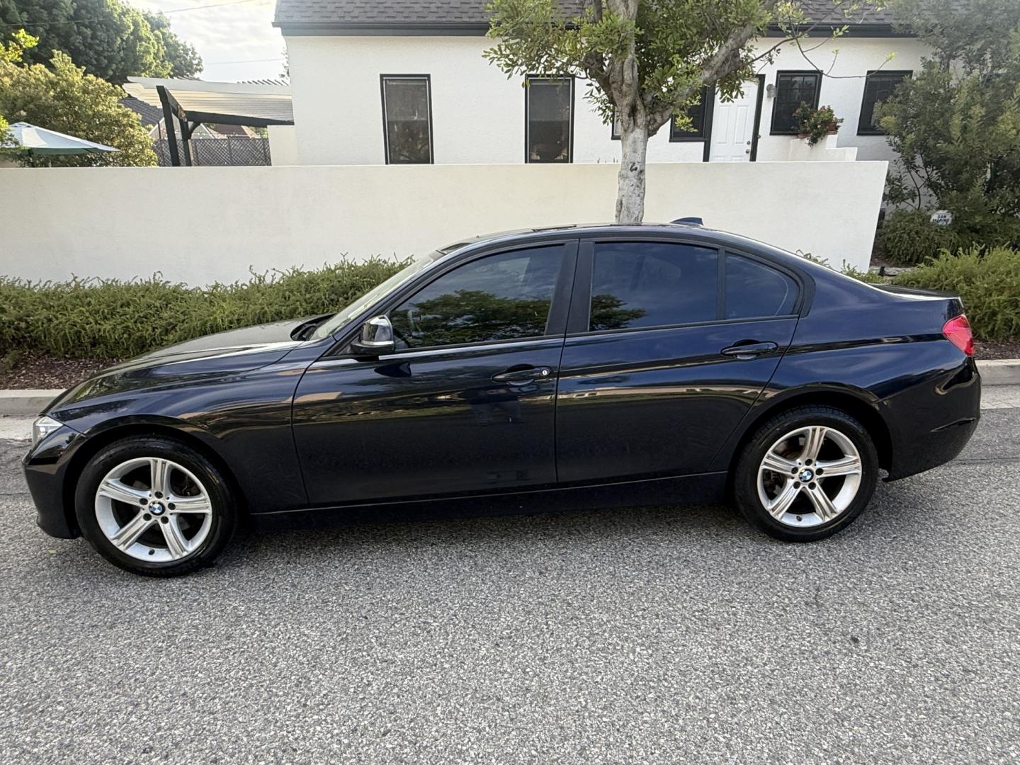 2012 Imperial Blue Metallic /Black BMW 3-Series 328i Sedan (WBA3A5G52CN) with an 2.0L L4 DOHC 16V engine, located at 30 S. Berkeley Avenue, Pasadena, CA, 91107, (626) 248-7567, 34.145447, -118.109398 - DEALER IDENTIFIER: Crown City Motors Sales | Buy Here Pay Here Pasadena TARGET REGIONS: Pasadena, San Gabriel Valley, Riverside, San Bernardino FINANCING SPECIALTY: Subprime Auto Lending, In-House Financing, Bad Credit Car Loans CA VEHICLE: 2012 BMW 328i Sedan w/ Nav and Backup Camera (VIN: WBA- Photo#1
