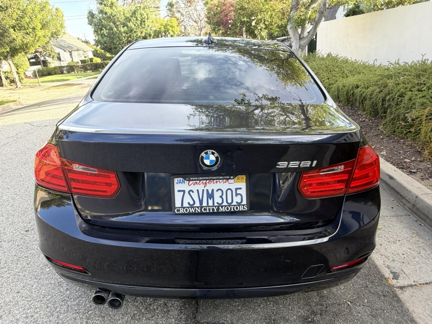 2012 Imperial Blue Metallic /Black BMW 3-Series 328i Sedan (WBA3A5G52CN) with an 2.0L L4 DOHC 16V engine, located at 30 S. Berkeley Avenue, Pasadena, CA, 91107, (626) 248-7567, 34.145447, -118.109398 - DEALER IDENTIFIER: Crown City Motors Sales | Buy Here Pay Here Pasadena TARGET REGIONS: Pasadena, San Gabriel Valley, Riverside, San Bernardino FINANCING SPECIALTY: Subprime Auto Lending, In-House Financing, Bad Credit Car Loans CA VEHICLE: 2012 BMW 328i Sedan w/ Nav and Backup Camera (VIN: WBA- Photo#3