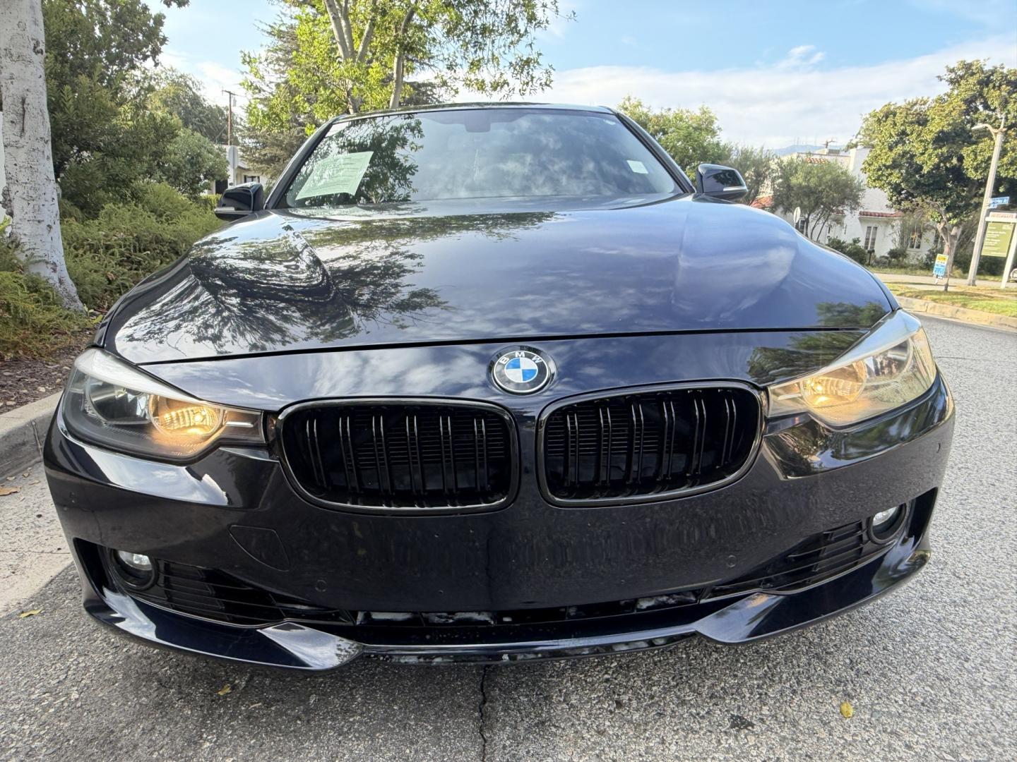2012 Imperial Blue Metallic /Black BMW 3-Series 328i Sedan (WBA3A5G52CN) with an 2.0L L4 DOHC 16V engine, located at 30 S. Berkeley Avenue, Pasadena, CA, 91107, (626) 248-7567, 34.145447, -118.109398 - DEALER IDENTIFIER: Crown City Motors Sales | Buy Here Pay Here Pasadena TARGET REGIONS: Pasadena, San Gabriel Valley, Riverside, San Bernardino FINANCING SPECIALTY: Subprime Auto Lending, In-House Financing, Bad Credit Car Loans CA VEHICLE: 2012 BMW 328i Sedan w/ Nav and Backup Camera (VIN: WBA- Photo#8