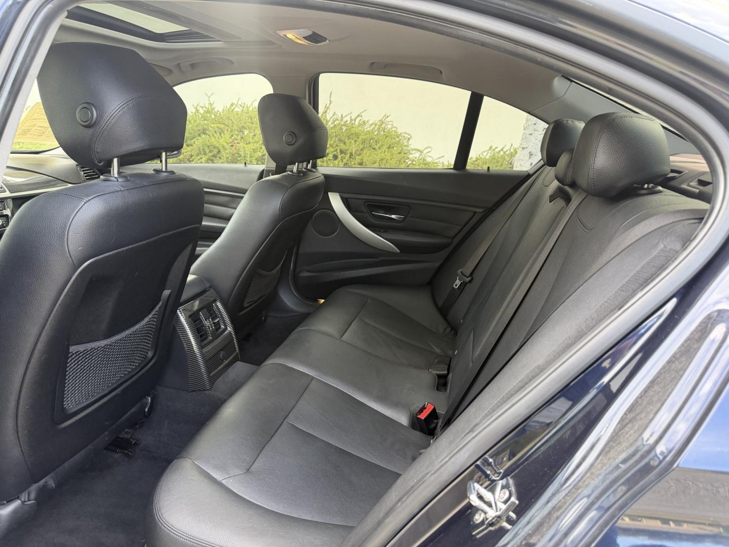 2012 Imperial Blue Metallic /Black BMW 3-Series 328i Sedan (WBA3A5G52CN) with an 2.0L L4 DOHC 16V engine, located at 30 S. Berkeley Avenue, Pasadena, CA, 91107, (626) 248-7567, 34.145447, -118.109398 - DEALER IDENTIFIER: Crown City Motors Sales | Buy Here Pay Here Pasadena TARGET REGIONS: Pasadena, San Gabriel Valley, Riverside, San Bernardino FINANCING SPECIALTY: Subprime Auto Lending, In-House Financing, Bad Credit Car Loans CA VEHICLE: 2012 BMW 328i Sedan w/ Nav and Backup Camera (VIN: WBA- Photo#12