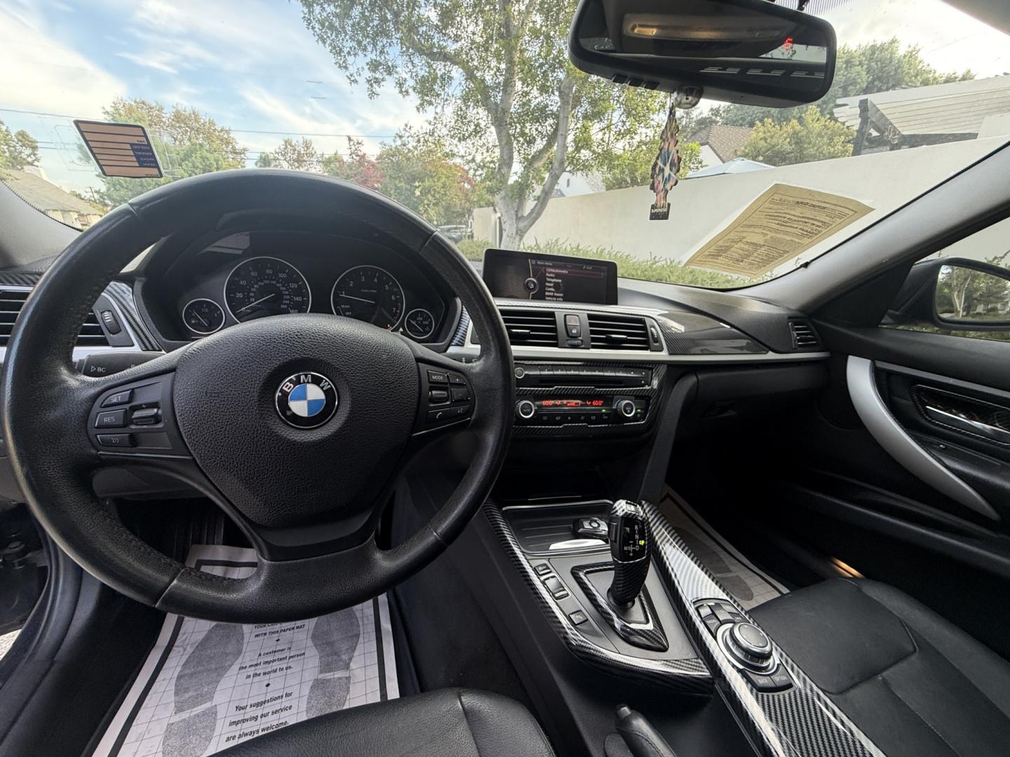 2012 Imperial Blue Metallic /Black BMW 3-Series 328i Sedan (WBA3A5G52CN) with an 2.0L L4 DOHC 16V engine, located at 30 S. Berkeley Avenue, Pasadena, CA, 91107, (626) 248-7567, 34.145447, -118.109398 - DEALER IDENTIFIER: Crown City Motors Sales | Buy Here Pay Here Pasadena TARGET REGIONS: Pasadena, San Gabriel Valley, Riverside, San Bernardino FINANCING SPECIALTY: Subprime Auto Lending, In-House Financing, Bad Credit Car Loans CA VEHICLE: 2012 BMW 328i Sedan w/ Nav and Backup Camera (VIN: WBA- Photo#14