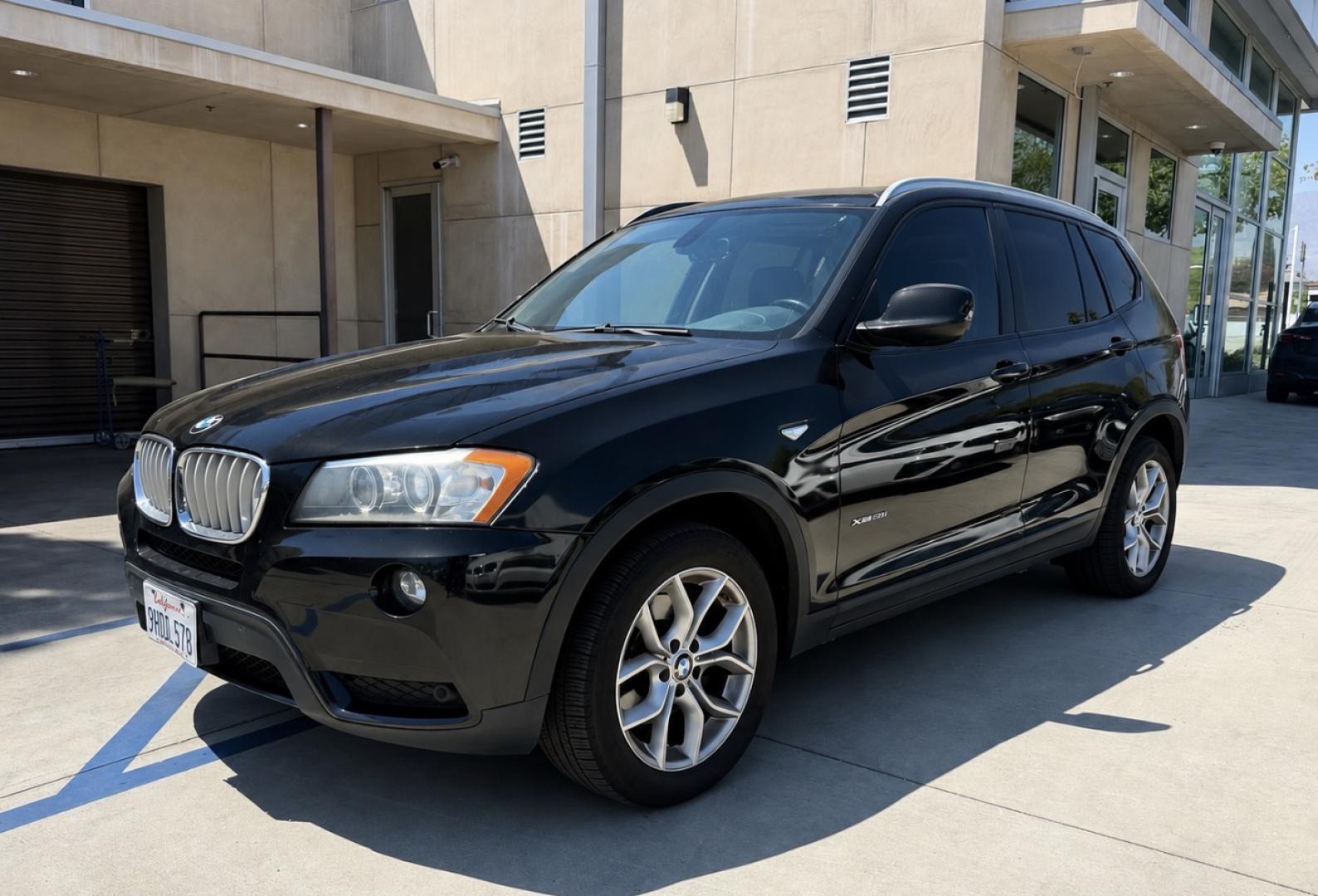 2012 Black /black BMW X3 xDrive28i (5UXWX5C54CL) with an 3.0L L6 DOHC 24V engine, 8-Speed Automatic transmission, located at 30 S. Berkeley Avenue, Pasadena, CA, 91107, (626) 248-7567, 34.145447, -118.109398 - Crown City Motors is a used “Buy Here Pay Here” car dealer in Pasadena CA. “Buy Here Pay Here” financing, means that when you purchase your vehicle from our dealership, that you make the payments to the dealership as well. We do not need the banks approval to get you approved for a used auto- Photo#0