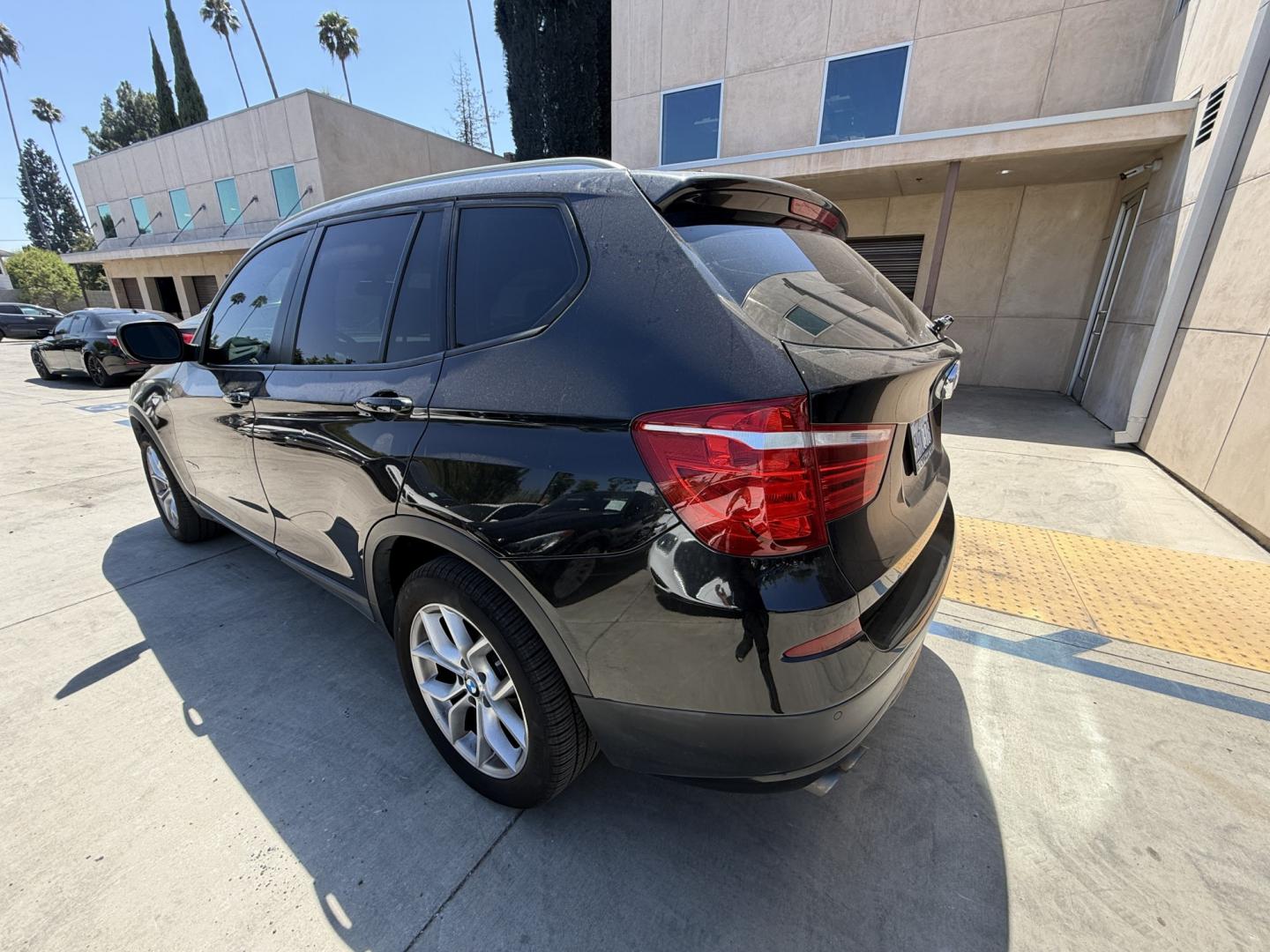 2012 Black /black BMW X3 xDrive28i (5UXWX5C54CL) with an 3.0L L6 DOHC 24V engine, 8-Speed Automatic transmission, located at 30 S. Berkeley Avenue, Pasadena, CA, 91107, (626) 248-7567, 34.145447, -118.109398 - Crown City Motors is a used “Buy Here Pay Here” car dealer in Pasadena CA. “Buy Here Pay Here” financing, means that when you purchase your vehicle from our dealership, that you make the payments to the dealership as well. We do not need the banks approval to get you approved for a used auto- Photo#2