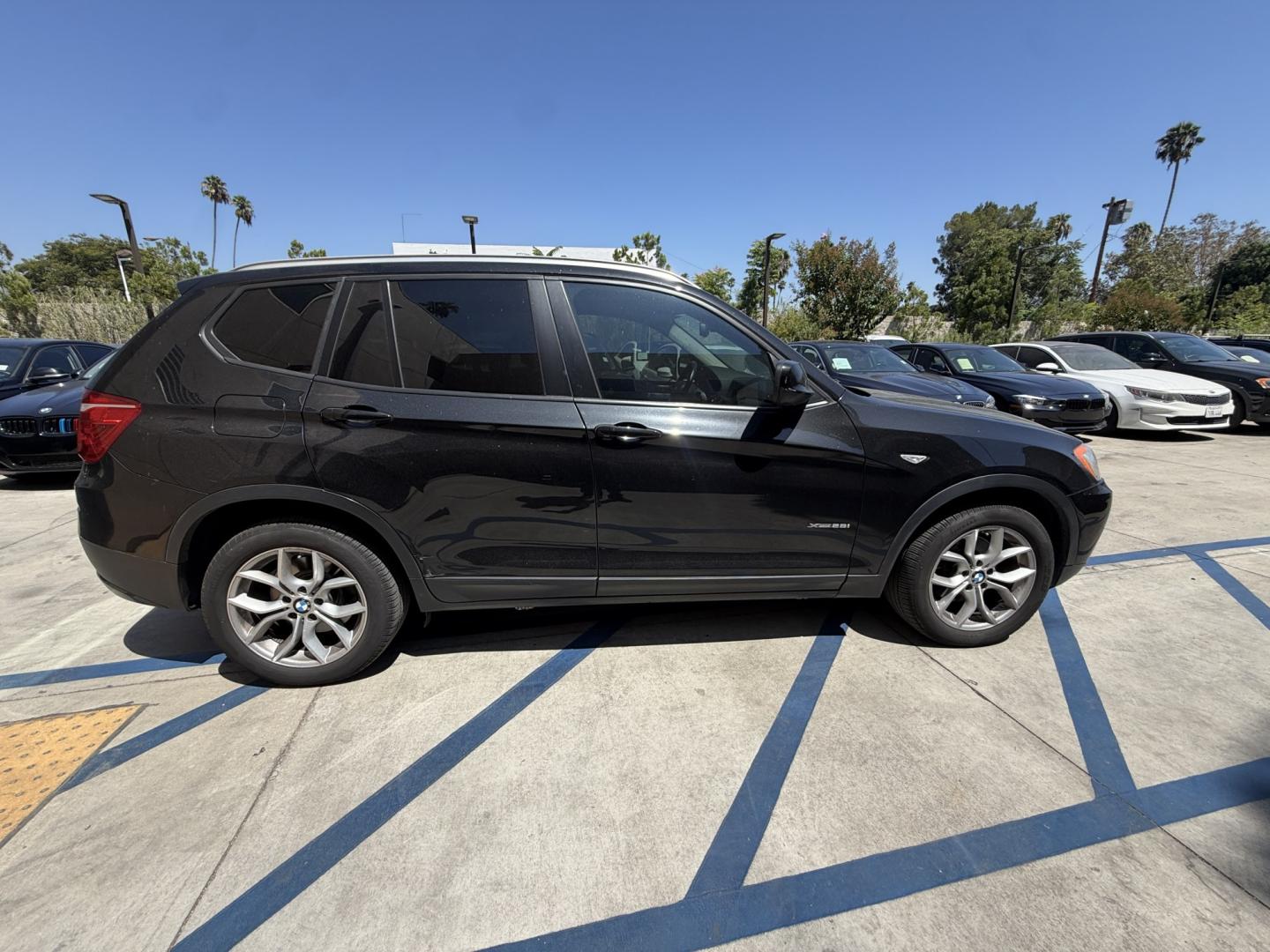 2012 Black /black BMW X3 xDrive28i (5UXWX5C54CL) with an 3.0L L6 DOHC 24V engine, 8-Speed Automatic transmission, located at 30 S. Berkeley Avenue, Pasadena, CA, 91107, (626) 248-7567, 34.145447, -118.109398 - Crown City Motors is a used “Buy Here Pay Here” car dealer in Pasadena CA. “Buy Here Pay Here” financing, means that when you purchase your vehicle from our dealership, that you make the payments to the dealership as well. We do not need the banks approval to get you approved for a used auto- Photo#5