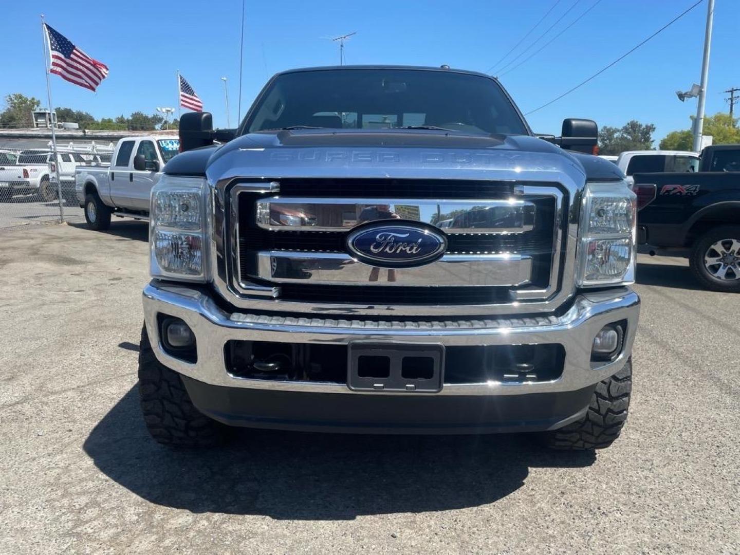 2012 Black Ford F-250 Super Duty Lariat (1FT7W2BT3CE) with an 6.7L Power Stroke 6.7L Biodiesel Turbo V8 400hp 800ft. lbs. Common Rail Direct Injection engine, 6-Speed Shiftable Automatic transmission, located at 800 Riverside Ave, Roseville, CA, 95678, 916-773-4549 & Toll Free: 866-719-4393, 38.732265, -121.291039 - DIESEL CREW CAB 4X4 LARIAT LIFTED CLEAN CARFAX - Photo#7