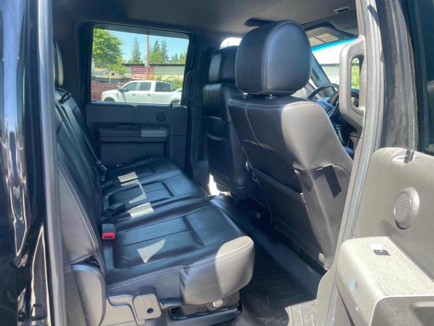 2012 Black Ford F-250 Super Duty Lariat (1FT7W2BT3CE) with an 6.7L Power Stroke 6.7L Biodiesel Turbo V8 400hp 800ft. lbs. Common Rail Direct Injection engine, 6-Speed Shiftable Automatic transmission, located at 800 Riverside Ave, Roseville, CA, 95678, 916-773-4549 & Toll Free: 866-719-4393, 38.732265, -121.291039 - DIESEL CREW CAB 4X4 LARIAT LIFTED CLEAN CARFAX - Photo#12