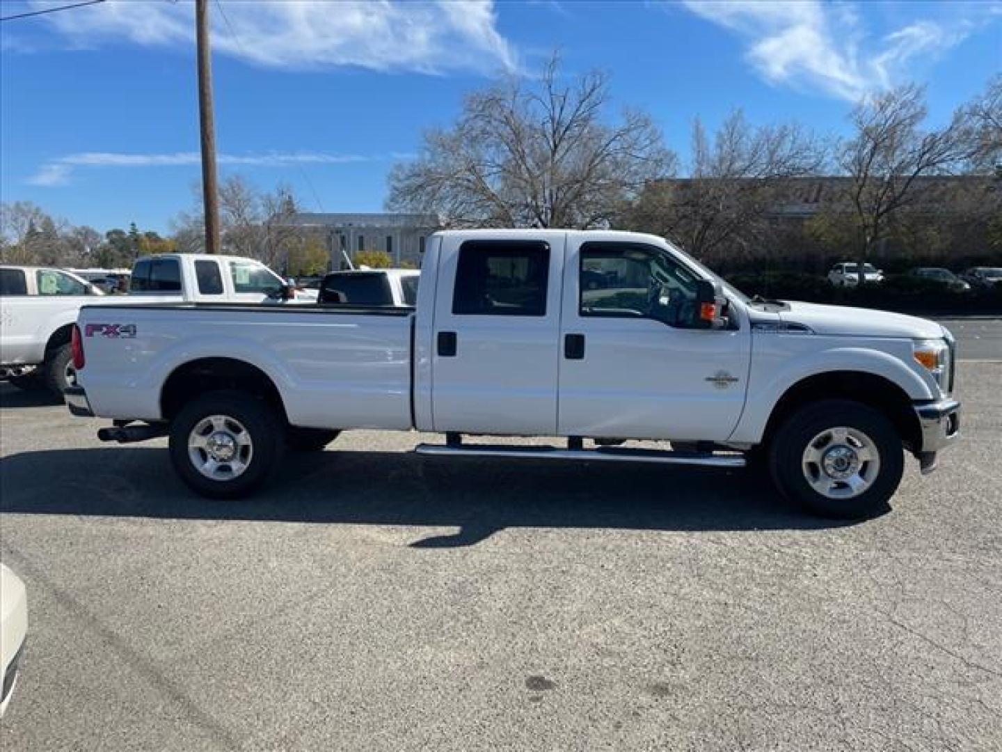 2012 Oxford White Ford F-350 Super Duty XLT (1FT8W3BTXCE) with an 6.7L Power Stroke 6.7L Biodiesel Turbo V8 400hp 800ft. lbs. Common Rail Direct Injection engine, 6-Speed Shiftable Automatic transmission, located at 800 Riverside Ave, Roseville, CA, 95678, 916-773-4549 & Toll Free: 866-719-4393, 38.732265, -121.291039 - DIESEL CREW CAB 4X4 FX4 XLT SERVICE RECORDS ON CLEAN CARFAX - Photo#5