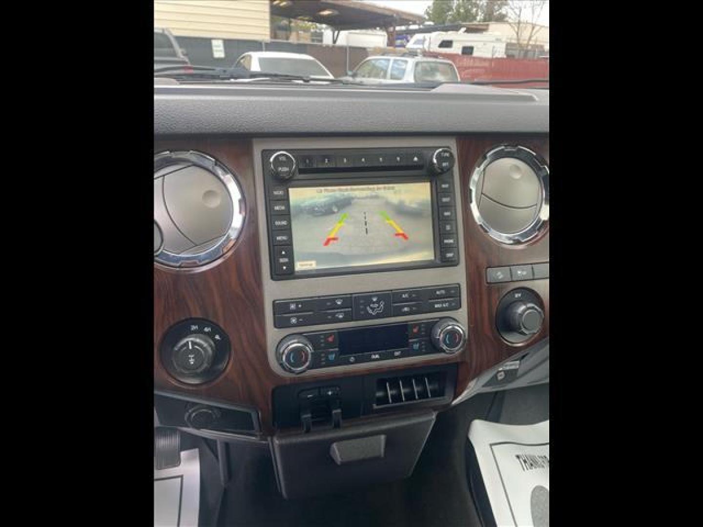 2012 Oxford White Ford F-350 Super Duty Lariat (1FT8W3BT1CE) with an 6.7L Power Stroke 6.7L Biodiesel Turbo V8 400hp 800ft. lbs. Common Rail Direct Injection engine, 6-Speed Shiftable Automatic transmission, located at 800 Riverside Ave, Roseville, CA, 95678, 916-773-4549 & Toll Free: 866-719-4393, 38.732265, -121.291039 - DIESEL CREW CAB 4X4 LARIAT MOON ROOF CLEAN CARFAX - Photo#10