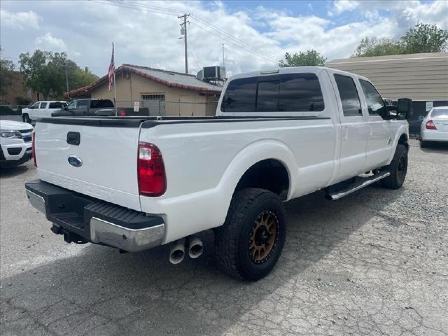 2012 Oxford White Ford F-350 Super Duty Lariat (1FT8W3BT1CE) with an 6.7L Power Stroke 6.7L Biodiesel Turbo V8 400hp 800ft. lbs. Common Rail Direct Injection engine, 6-Speed Shiftable Automatic transmission, located at 800 Riverside Ave, Roseville, CA, 95678, 916-773-4549 & Toll Free: 866-719-4393, 38.732265, -121.291039 - DIESEL CREW CAB 4X4 LARIAT MOON ROOF CLEAN CARFAX - Photo#4