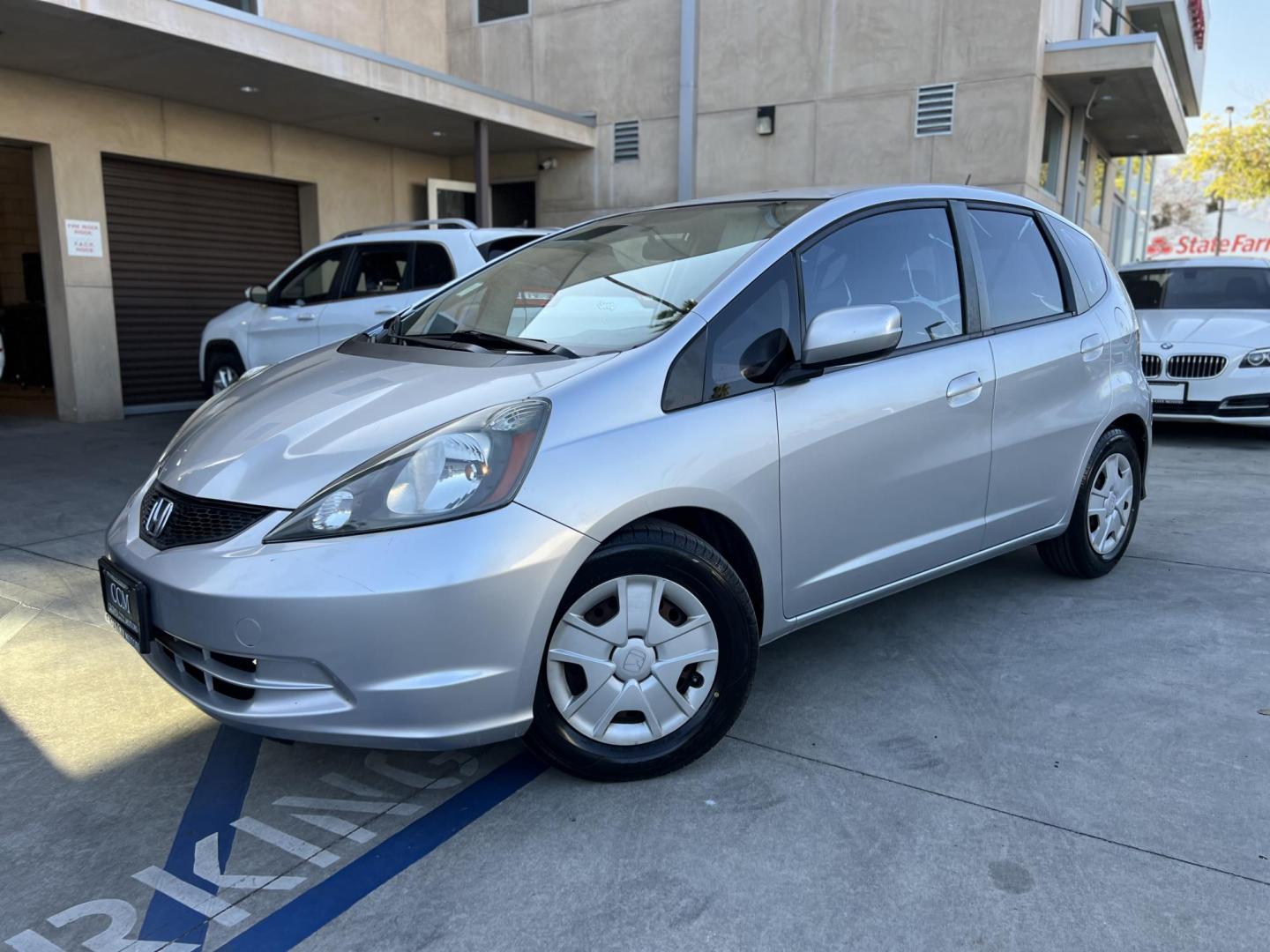 2012 Silver /Black Honda Fit 5-Speed AT (JHMGE8H30CC) with an 1.5L L4 SOHC 16V engine, 5-Speed Automatic transmission, located at 30 S. Berkeley Avenue, Pasadena, CA, 91107, (626) 248-7567, 34.145447, -118.109398 - Reliable 2012 Honda Fit – Automatic – Buy Here Pay Here – Silver – Bad Credit OK! Looking for a fuel-efficient hatchback with Honda reliability and flexible financing? This 2012 Honda Fit with Automatic Transmission in Silver is the perfect solution. Available now at Crown City Motors in - Photo#0