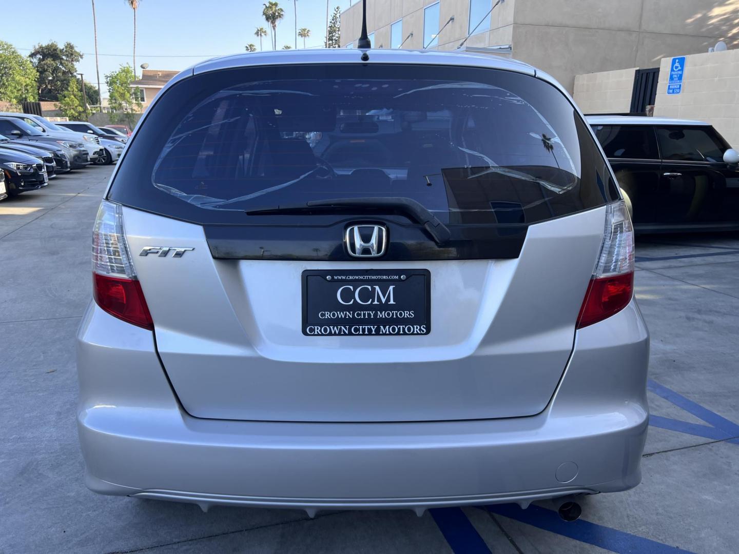 2012 Silver /Black Honda Fit 5-Speed AT (JHMGE8H30CC) with an 1.5L L4 SOHC 16V engine, 5-Speed Automatic transmission, located at 30 S. Berkeley Avenue, Pasadena, CA, 91107, (626) 248-7567, 34.145447, -118.109398 - Reliable 2012 Honda Fit – Automatic – Buy Here Pay Here – Silver – Bad Credit OK! Looking for a fuel-efficient hatchback with Honda reliability and flexible financing? This 2012 Honda Fit with Automatic Transmission in Silver is the perfect solution. Available now at Crown City Motors in - Photo#2