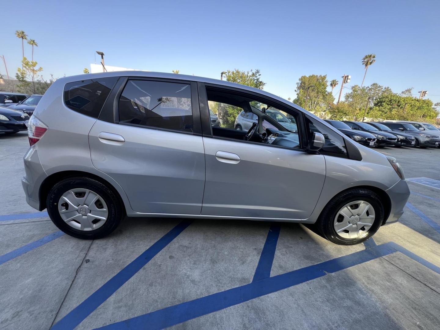 2012 Silver /Black Honda Fit 5-Speed AT (JHMGE8H30CC) with an 1.5L L4 SOHC 16V engine, 5-Speed Automatic transmission, located at 30 S. Berkeley Avenue, Pasadena, CA, 91107, (626) 248-7567, 34.145447, -118.109398 - Reliable 2012 Honda Fit – Automatic – Buy Here Pay Here – Silver – Bad Credit OK! Looking for a fuel-efficient hatchback with Honda reliability and flexible financing? This 2012 Honda Fit with Automatic Transmission in Silver is the perfect solution. Available now at Crown City Motors in - Photo#5
