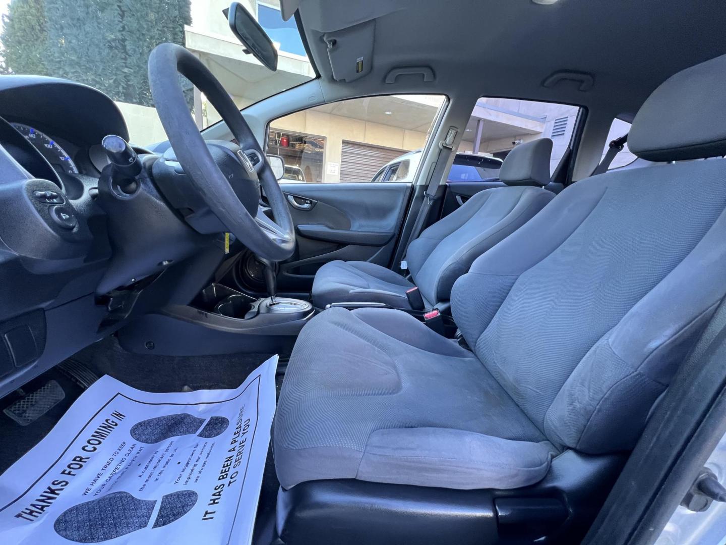 2012 Silver /Black Honda Fit 5-Speed AT (JHMGE8H30CC) with an 1.5L L4 SOHC 16V engine, 5-Speed Automatic transmission, located at 30 S. Berkeley Avenue, Pasadena, CA, 91107, (626) 248-7567, 34.145447, -118.109398 - Reliable 2012 Honda Fit – Automatic – Buy Here Pay Here – Silver – Bad Credit OK! Looking for a fuel-efficient hatchback with Honda reliability and flexible financing? This 2012 Honda Fit with Automatic Transmission in Silver is the perfect solution. Available now at Crown City Motors in - Photo#10