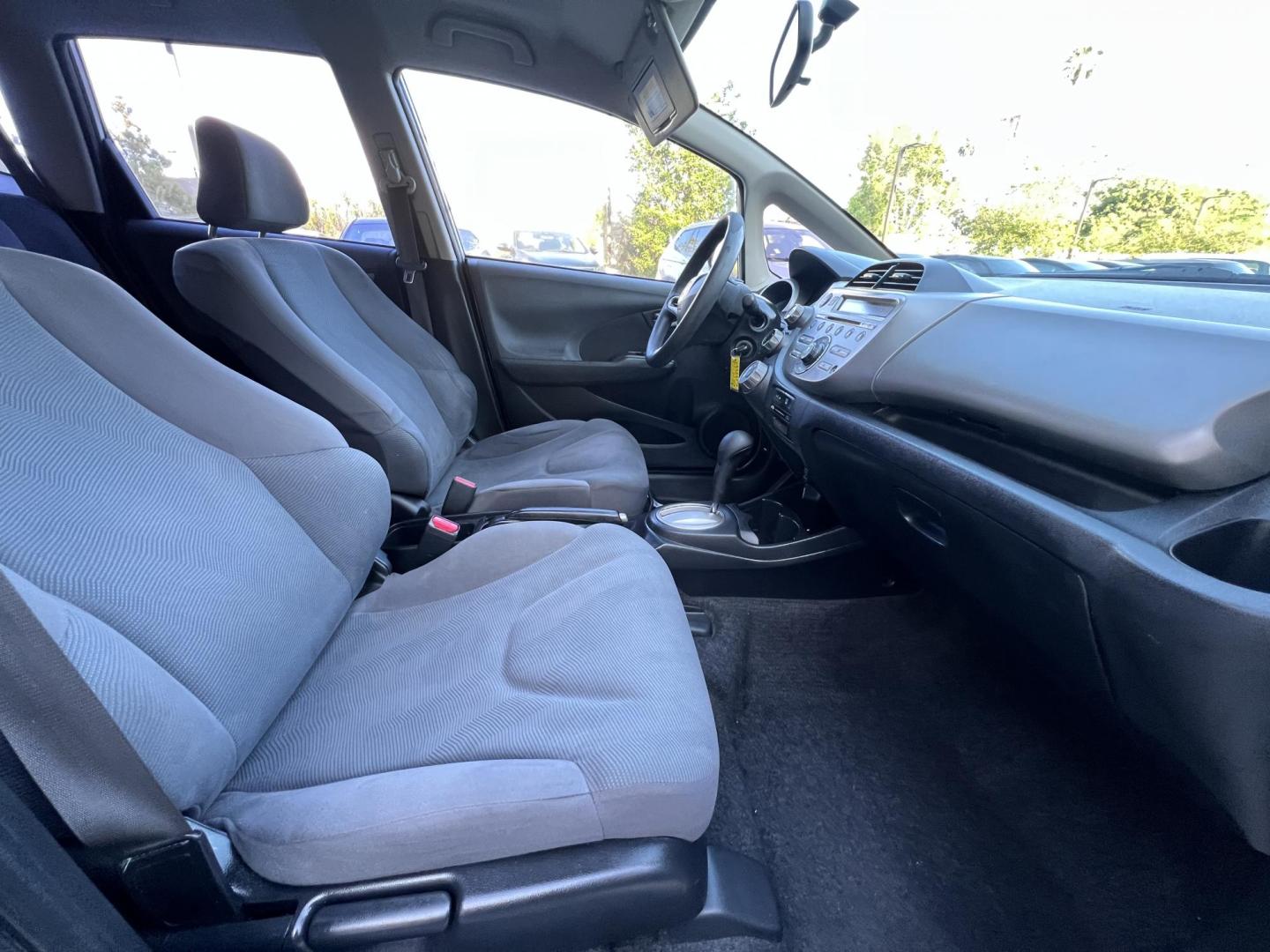2012 Silver /Black Honda Fit 5-Speed AT (JHMGE8H30CC) with an 1.5L L4 SOHC 16V engine, 5-Speed Automatic transmission, located at 30 S. Berkeley Avenue, Pasadena, CA, 91107, (626) 248-7567, 34.145447, -118.109398 - Reliable 2012 Honda Fit – Automatic – Buy Here Pay Here – Silver – Bad Credit OK! Looking for a fuel-efficient hatchback with Honda reliability and flexible financing? This 2012 Honda Fit with Automatic Transmission in Silver is the perfect solution. Available now at Crown City Motors in - Photo#17