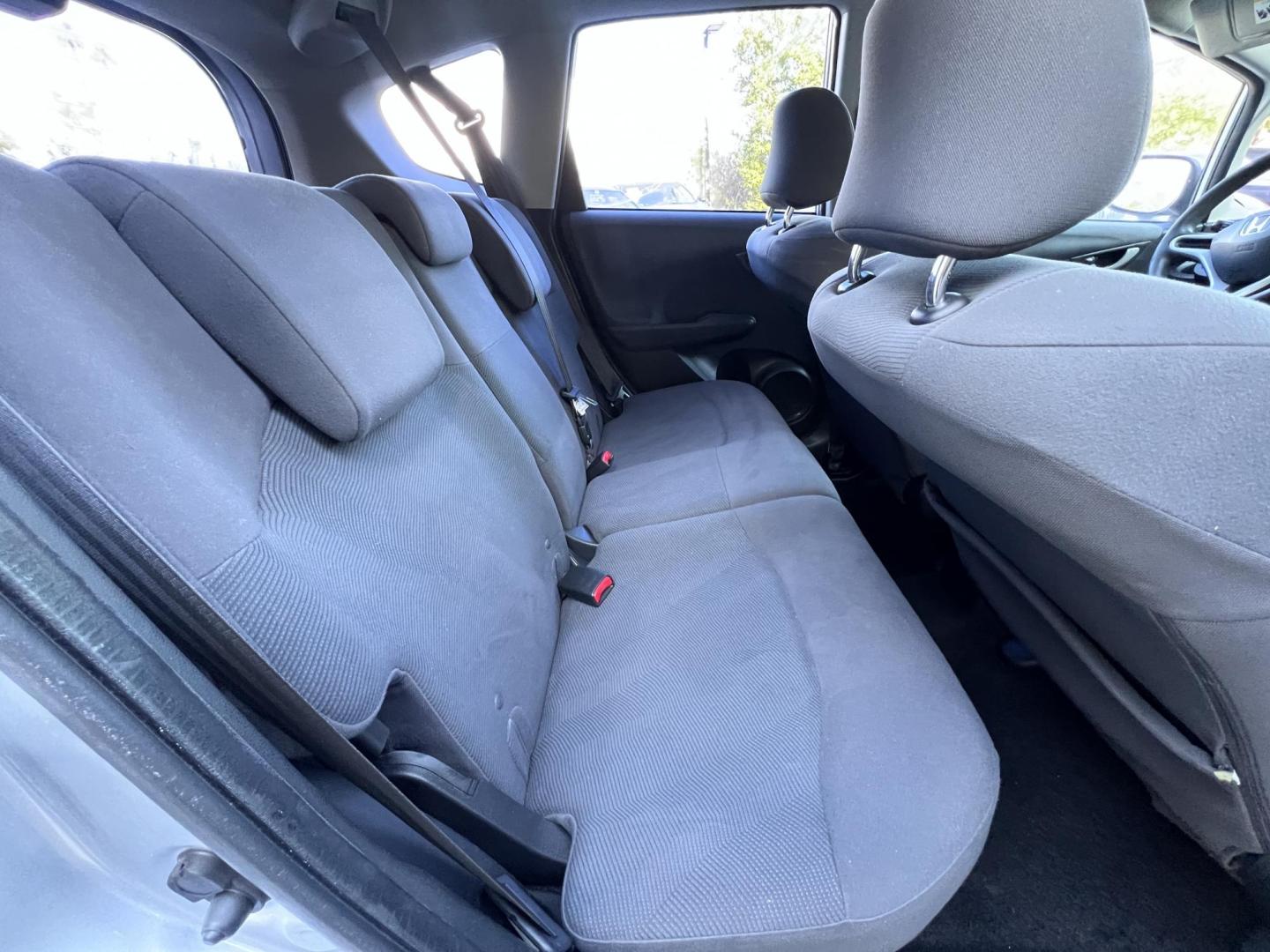 2012 Silver /Black Honda Fit 5-Speed AT (JHMGE8H30CC) with an 1.5L L4 SOHC 16V engine, 5-Speed Automatic transmission, located at 30 S. Berkeley Avenue, Pasadena, CA, 91107, (626) 248-7567, 34.145447, -118.109398 - Reliable 2012 Honda Fit – Automatic – Buy Here Pay Here – Silver – Bad Credit OK! Looking for a fuel-efficient hatchback with Honda reliability and flexible financing? This 2012 Honda Fit with Automatic Transmission in Silver is the perfect solution. Available now at Crown City Motors in - Photo#20