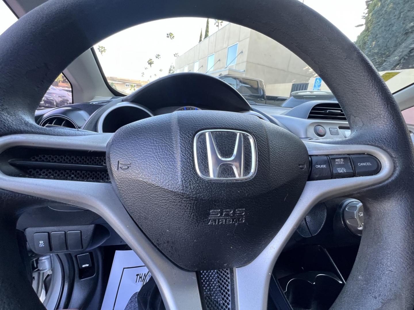 2012 Silver /Black Honda Fit 5-Speed AT (JHMGE8H30CC) with an 1.5L L4 SOHC 16V engine, 5-Speed Automatic transmission, located at 30 S. Berkeley Avenue, Pasadena, CA, 91107, (626) 248-7567, 34.145447, -118.109398 - Reliable 2012 Honda Fit – Automatic – Buy Here Pay Here – Silver – Bad Credit OK! Looking for a fuel-efficient hatchback with Honda reliability and flexible financing? This 2012 Honda Fit with Automatic Transmission in Silver is the perfect solution. Available now at Crown City Motors in - Photo#24