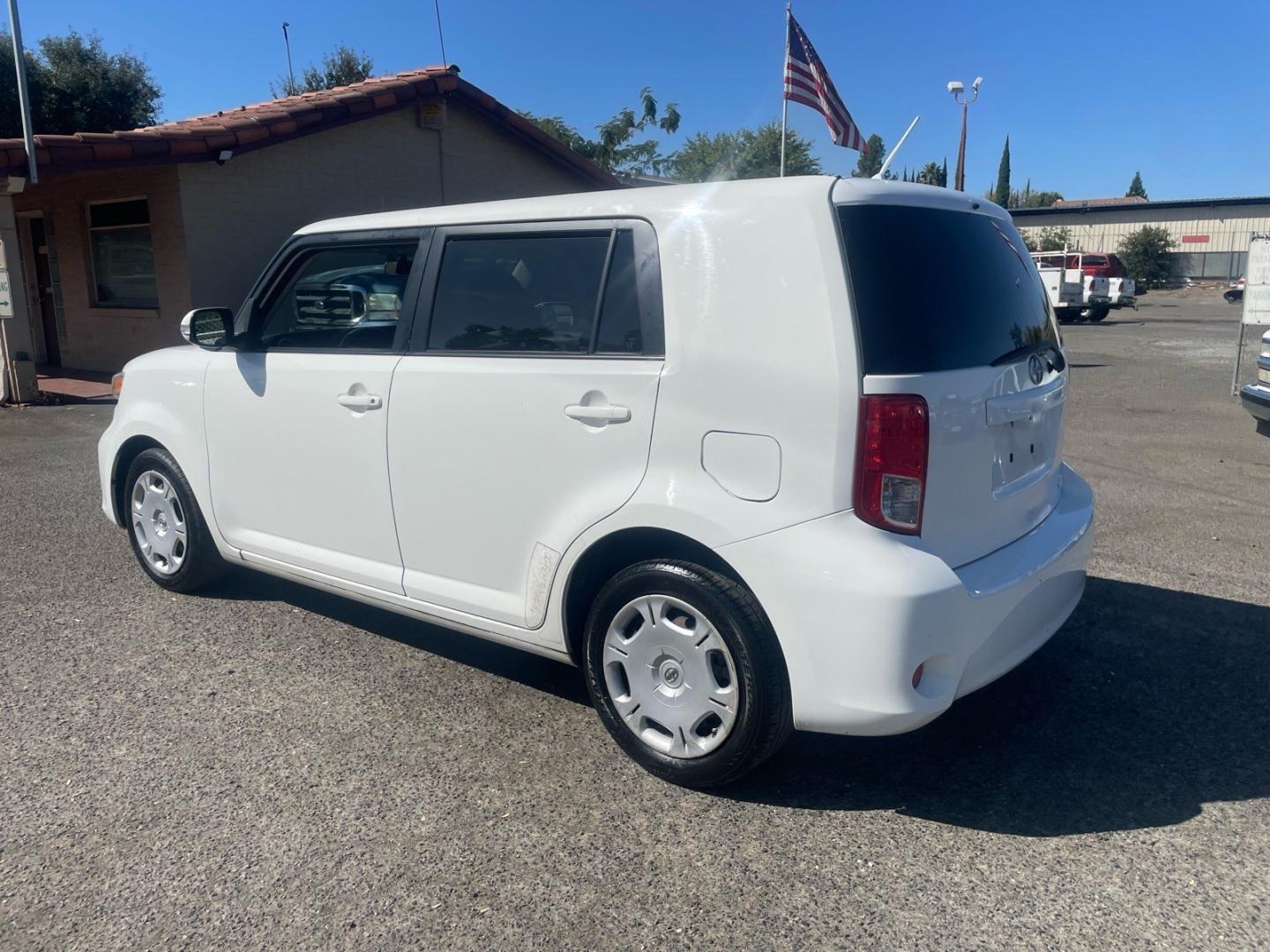 2012 Super White Scion xB Base (JTLZE4FE3CJ) with an 2.4L 2.4L I4 158hp 162ft. lbs. Sequential Electronic Fuel Injection engine, 4-Speed Automatic transmission, located at 800 Riverside Ave, Roseville, CA, 95678, 916-773-4549 & Toll Free: 866-719-4393, 38.732265, -121.291039- Photo#2