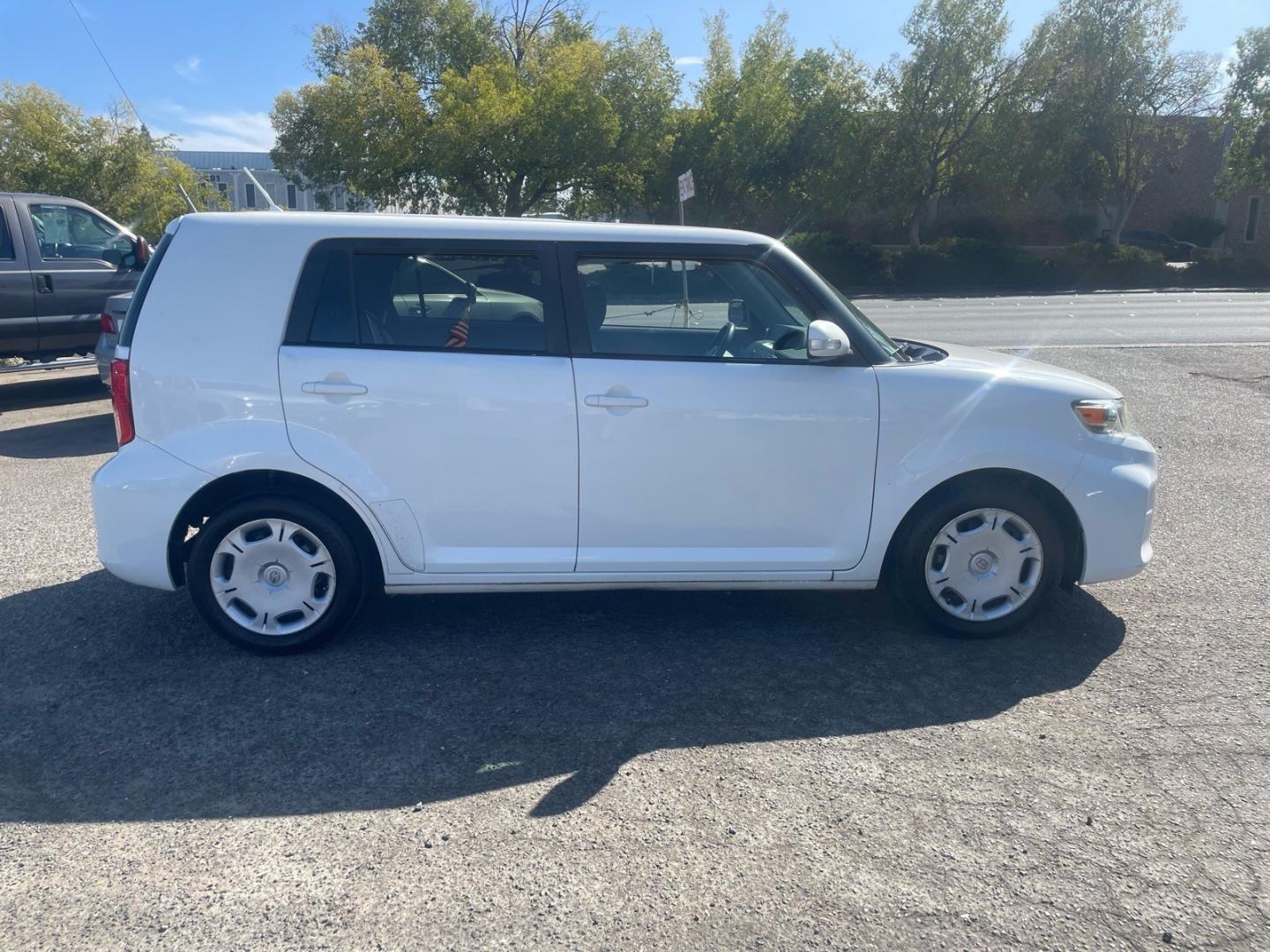 2012 Super White Scion xB Base (JTLZE4FE3CJ) with an 2.4L 2.4L I4 158hp 162ft. lbs. Sequential Electronic Fuel Injection engine, 4-Speed Automatic transmission, located at 800 Riverside Ave, Roseville, CA, 95678, 916-773-4549 & Toll Free: 866-719-4393, 38.732265, -121.291039- Photo#5