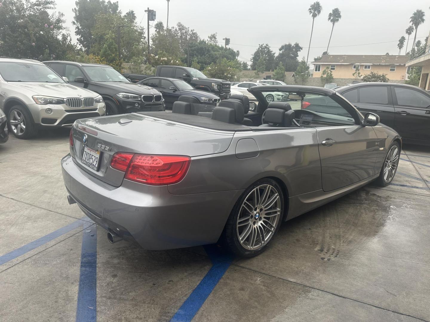 2013 Space Gray Metallic /Black BMW 3-Series 335i Convertible (WBADX7C56DJ) with an 3.0L L6 DOHC 24V engine, Automatic transmission, located at 30 S. Berkeley Avenue, Pasadena, CA, 91107, (626) 248-7567, 34.145447, -118.109398 - Convertible!! Navigation!! - Photo#18
