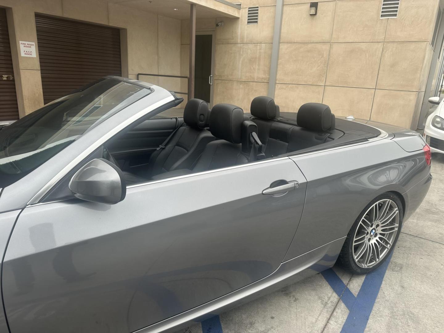 2013 Space Gray Metallic /Black BMW 3-Series 335i Convertible (WBADX7C56DJ) with an 3.0L L6 DOHC 24V engine, Automatic transmission, located at 30 S. Berkeley Avenue, Pasadena, CA, 91107, (626) 248-7567, 34.145447, -118.109398 - Convertible!! Navigation!! - Photo#19