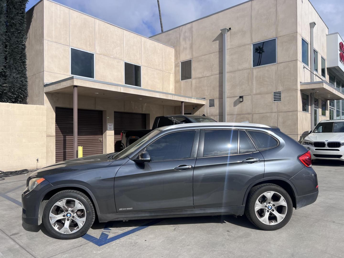 2013 Gray /BLACK BMW X1 sDrive28i (WBAVM1C50DV) with an 2.0L L4 DOHC 16V engine, 8-Speed Automatic transmission, located at 30 S. Berkeley Avenue, Pasadena, CA, 91107, (626) 248-7567, 34.145447, -118.109398 - Bad Credit? We can help! We are the bank. All our cars are thoroughly inspected and reconditioned by our technicians. FREE CARFAX report. Stop by or call to speak with our friendly staff. Whether you have bad credit, no credit, bankruptcy, or repossession, we can find the right loan package for you. - Photo#4