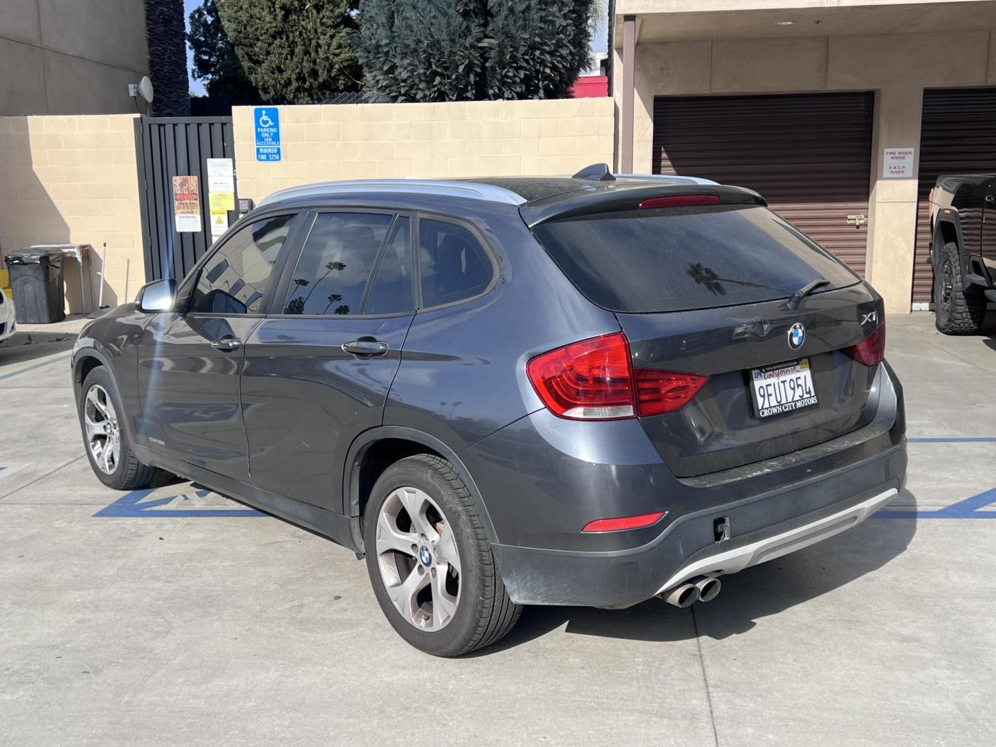 2013 Gray /BLACK BMW X1 sDrive28i (WBAVM1C50DV) with an 2.0L L4 DOHC 16V engine, 8-Speed Automatic transmission, located at 30 S. Berkeley Avenue, Pasadena, CA, 91107, (626) 248-7567, 34.145447, -118.109398 - Bad Credit? We can help! We are the bank. All our cars are thoroughly inspected and reconditioned by our technicians. FREE CARFAX report. Stop by or call to speak with our friendly staff. Whether you have bad credit, no credit, bankruptcy, or repossession, we can find the right loan package for you. - Photo#5