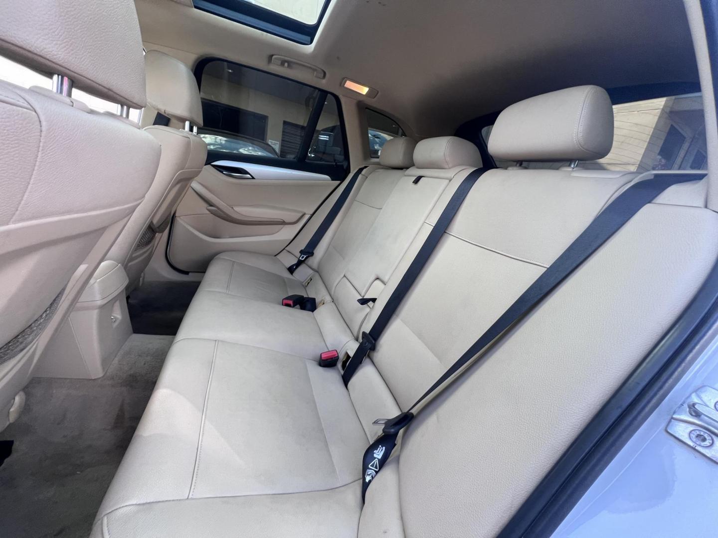 2013 White BMW X1 sDrive28i (WBAVM1C51DV) with an 2.0L L4 DOHC 16V engine, 8-Speed Automatic transmission, located at 30 S. Berkeley Avenue, Pasadena, CA, 91107, (626) 248-7567, 34.145447, -118.109398 - Crown City Motors is a used “Buy Here Pay Here” car dealer in Pasadena CA. “Buy Here Pay Here” financing, means that when you purchase your vehicle from our dealership, that you make the payments to the dealership as well. We do not need the banks approval to get you approved for a used auto - Photo#12