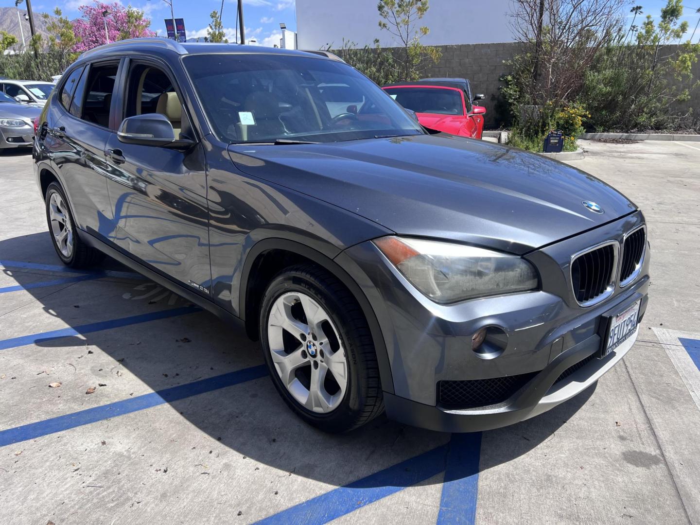 2013 Gray /BLACK BMW X1 sDrive28i (WBAVM1C50DV) with an 2.0L L4 DOHC 16V engine, 8-Speed Automatic transmission, located at 30 S. Berkeley Avenue, Pasadena, CA, 91107, (626) 248-7567, 34.145447, -118.109398 - Bad Credit? We can help! We are the bank. All our cars are thoroughly inspected and reconditioned by our technicians. FREE CARFAX report. Stop by or call to speak with our friendly staff. Whether you have bad credit, no credit, bankruptcy, or repossession, we can find the right loan package for you. - Photo#14