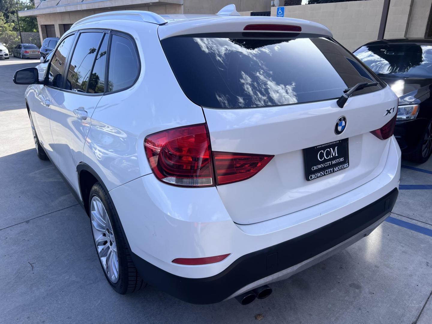 2013 White BMW X1 sDrive28i (WBAVM1C51DV) with an 2.0L L4 DOHC 16V engine, 8-Speed Automatic transmission, located at 30 S. Berkeley Avenue, Pasadena, CA, 91107, (626) 248-7567, 34.145447, -118.109398 - Crown City Motors is a used “Buy Here Pay Here” car dealer in Pasadena CA. “Buy Here Pay Here” financing, means that when you purchase your vehicle from our dealership, that you make the payments to the dealership as well. We do not need the banks approval to get you approved for a used auto - Photo#2