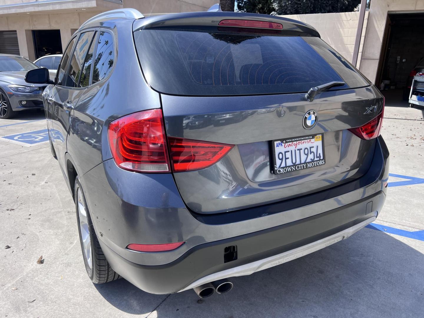 2013 Gray /BLACK BMW X1 sDrive28i (WBAVM1C50DV) with an 2.0L L4 DOHC 16V engine, 8-Speed Automatic transmission, located at 30 S. Berkeley Avenue, Pasadena, CA, 91107, (626) 248-7567, 34.145447, -118.109398 - Bad Credit? We can help! We are the bank. All our cars are thoroughly inspected and reconditioned by our technicians. FREE CARFAX report. Stop by or call to speak with our friendly staff. Whether you have bad credit, no credit, bankruptcy, or repossession, we can find the right loan package for you. - Photo#7