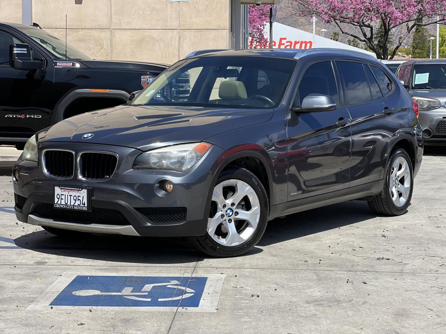 2013 Gray /BLACK BMW X1 sDrive28i (WBAVM1C50DV) with an 2.0L L4 DOHC 16V engine, 8-Speed Automatic transmission, located at 30 S. Berkeley Avenue, Pasadena, CA, 91107, (626) 248-7567, 34.145447, -118.109398 - Bad Credit? We can help! We are the bank. All our cars are thoroughly inspected and reconditioned by our technicians. FREE CARFAX report. Stop by or call to speak with our friendly staff. Whether you have bad credit, no credit, bankruptcy, or repossession, we can find the right loan package for you. - Photo#0