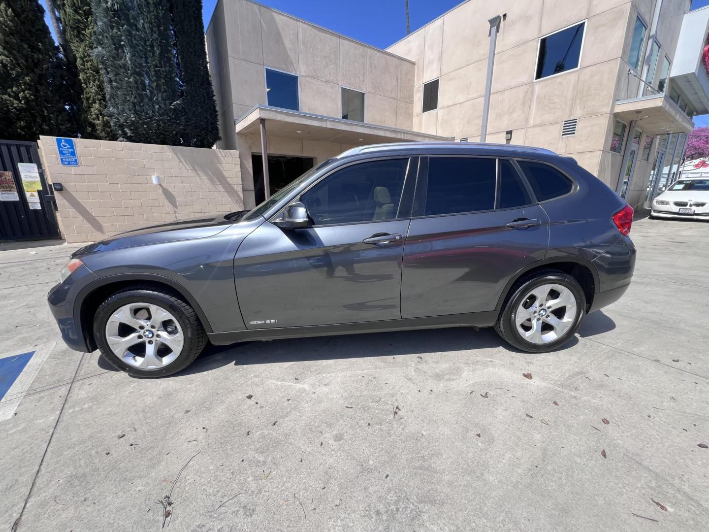 2013 Gray /BLACK BMW X1 sDrive28i (WBAVM1C50DV) with an 2.0L L4 DOHC 16V engine, 8-Speed Automatic transmission, located at 30 S. Berkeley Avenue, Pasadena, CA, 91107, (626) 248-7567, 34.145447, -118.109398 - Bad Credit? We can help! We are the bank. All our cars are thoroughly inspected and reconditioned by our technicians. FREE CARFAX report. Stop by or call to speak with our friendly staff. Whether you have bad credit, no credit, bankruptcy, or repossession, we can find the right loan package for you. - Photo#3