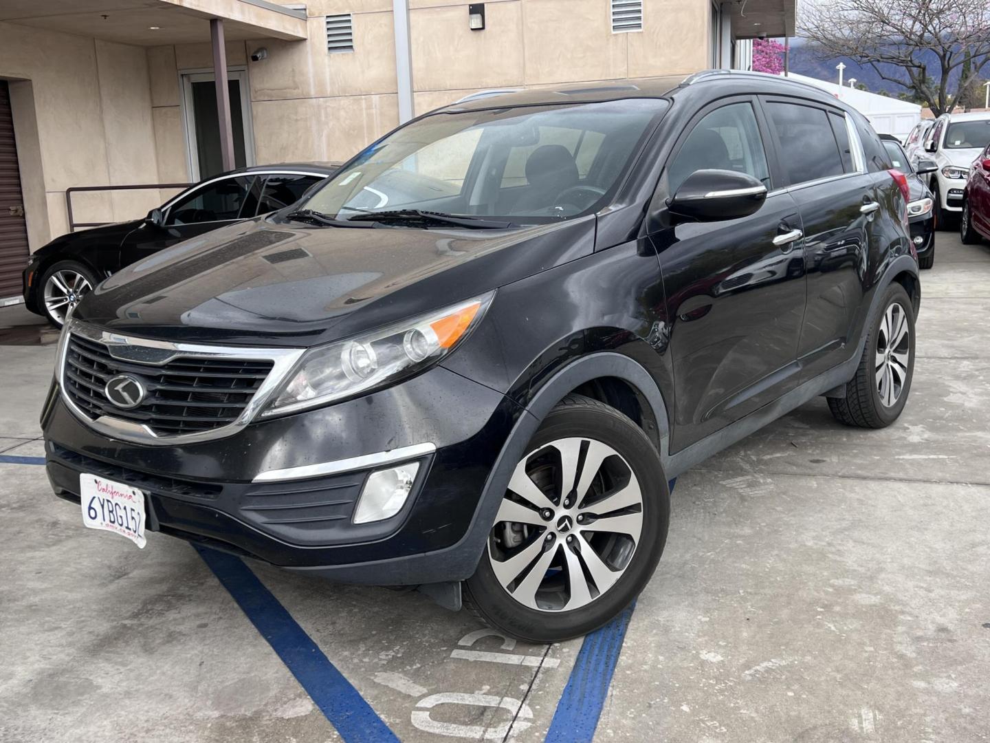 2013 Black /Black Kia Sportage EX FWD (KNDPC3A26D7) with an 2.4L V6 DOHC 24V engine, 6-Speed Automatic transmission, located at 30 S. Berkeley Avenue, Pasadena, CA, 91107, (626) 248-7567, 34.145447, -118.109398 - 2013 Kia Sportage EX FWD (VIN: KNDPC3A26D7404618) – A Reliable and Stylish Compact SUV If you’re in the market for a used compact SUV that blends style, reliability, and value, the 2013 Kia Sportage EX FWD (VIN: KNDPC3A26D7404618) deserves your attention. This well-crafted vehicle from Kia’s - Photo#0