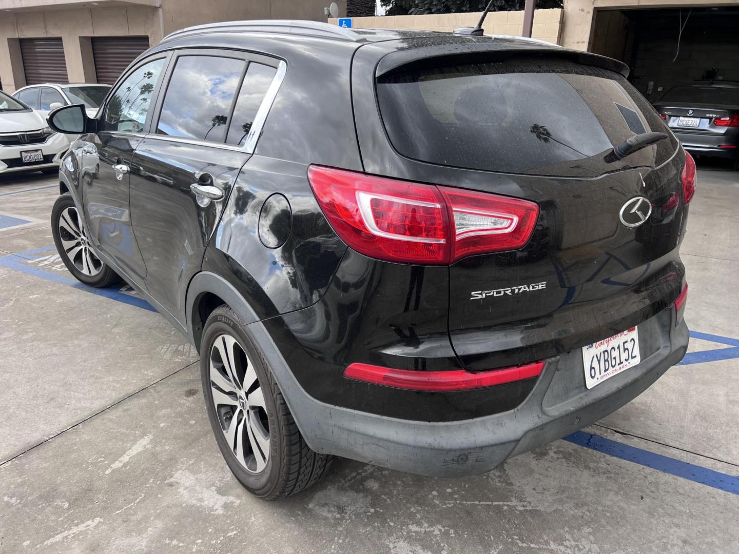 2013 Black /Black Kia Sportage EX FWD (KNDPC3A26D7) with an 2.4L V6 DOHC 24V engine, 6-Speed Automatic transmission, located at 30 S. Berkeley Avenue, Pasadena, CA, 91107, (626) 248-7567, 34.145447, -118.109398 - 2013 Kia Sportage EX FWD (VIN: KNDPC3A26D7404618) – A Reliable and Stylish Compact SUV If you’re in the market for a used compact SUV that blends style, reliability, and value, the 2013 Kia Sportage EX FWD (VIN: KNDPC3A26D7404618) deserves your attention. This well-crafted vehicle from Kia’s - Photo#1
