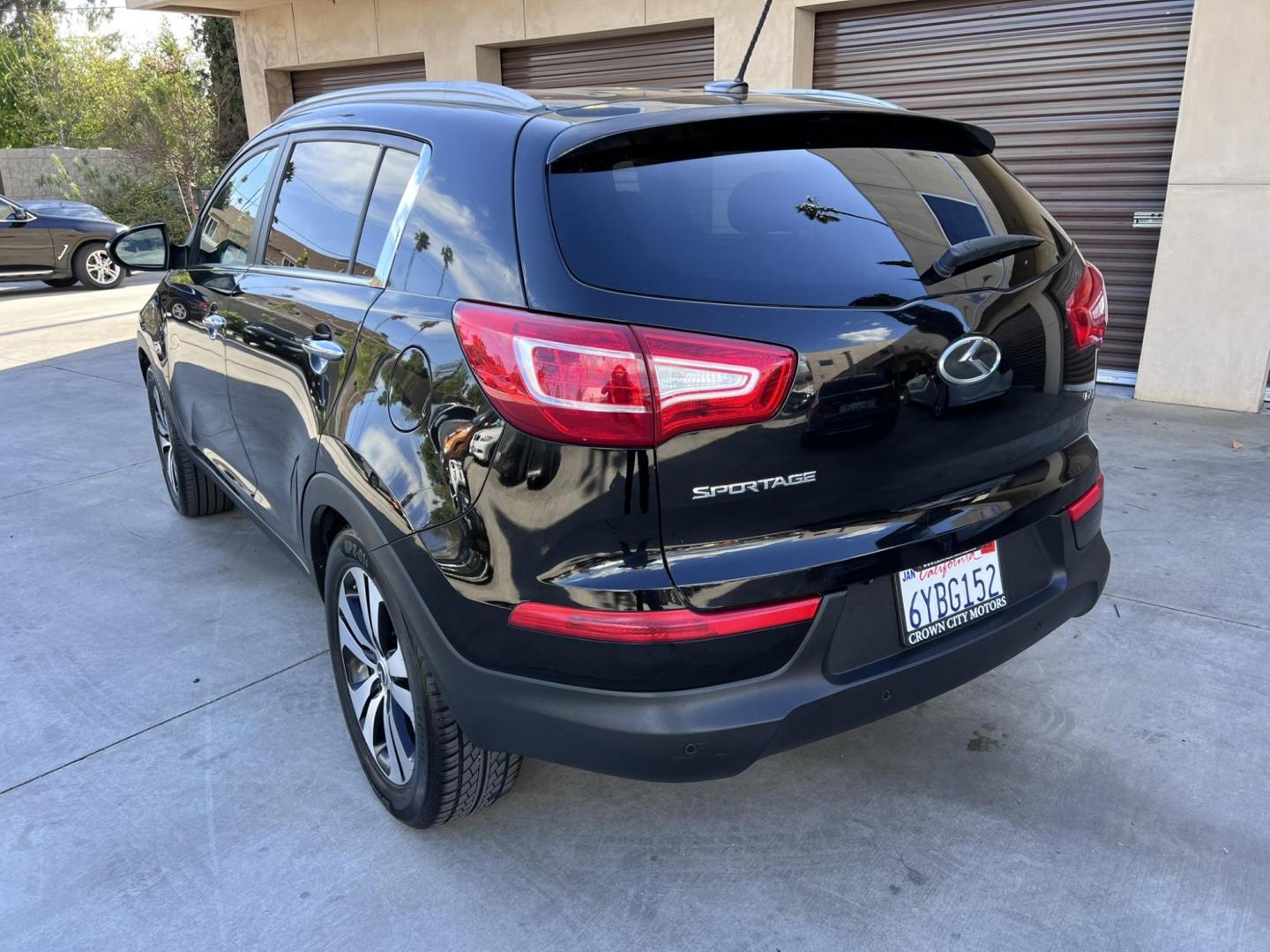 2013 Black /Black Kia Sportage EX FWD (KNDPC3A26D7) with an 2.4L V6 DOHC 24V engine, 6-Speed Automatic transmission, located at 30 S. Berkeley Avenue, Pasadena, CA, 91107, (626) 248-7567, 34.145447, -118.109398 - 2013 Kia Sportage EX FWD (VIN: KNDPC3A26D7404618) – A Reliable and Stylish Compact SUV If you’re in the market for a used compact SUV that blends style, reliability, and value, the 2013 Kia Sportage EX FWD (VIN: KNDPC3A26D7404618) deserves your attention. This well-crafted vehicle from Kia’s - Photo#11