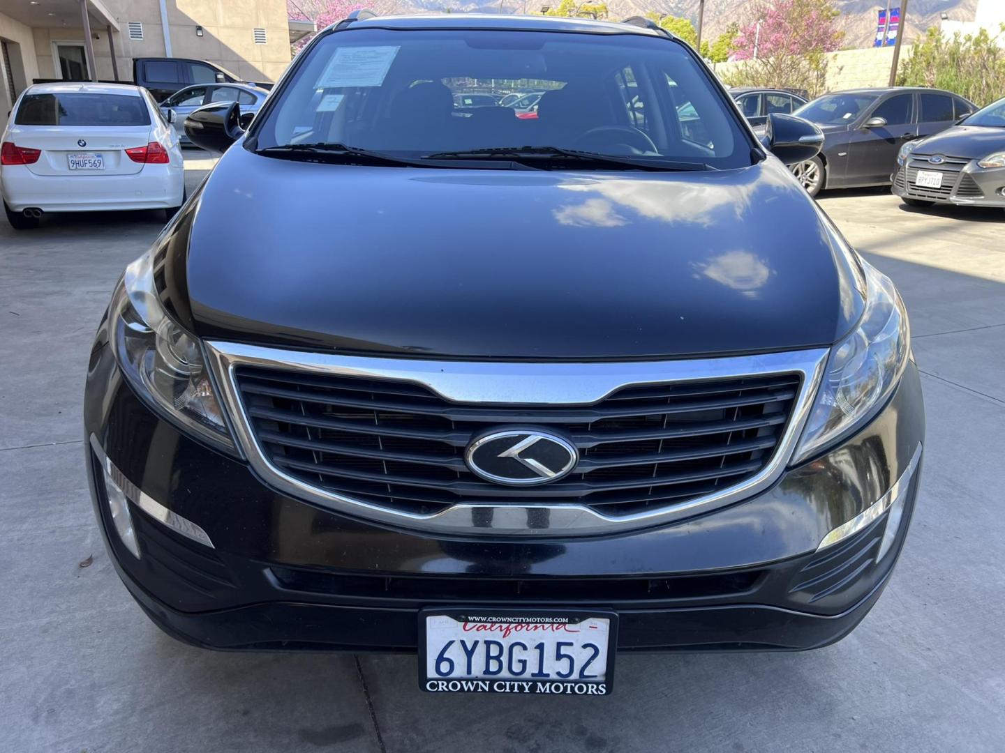 2013 Black /Black Kia Sportage EX FWD (KNDPC3A26D7) with an 2.4L V6 DOHC 24V engine, 6-Speed Automatic transmission, located at 30 S. Berkeley Avenue, Pasadena, CA, 91107, (626) 248-7567, 34.145447, -118.109398 - 2013 Kia Sportage EX FWD (VIN: KNDPC3A26D7404618) – A Reliable and Stylish Compact SUV If you’re in the market for a used compact SUV that blends style, reliability, and value, the 2013 Kia Sportage EX FWD (VIN: KNDPC3A26D7404618) deserves your attention. This well-crafted vehicle from Kia’s - Photo#14