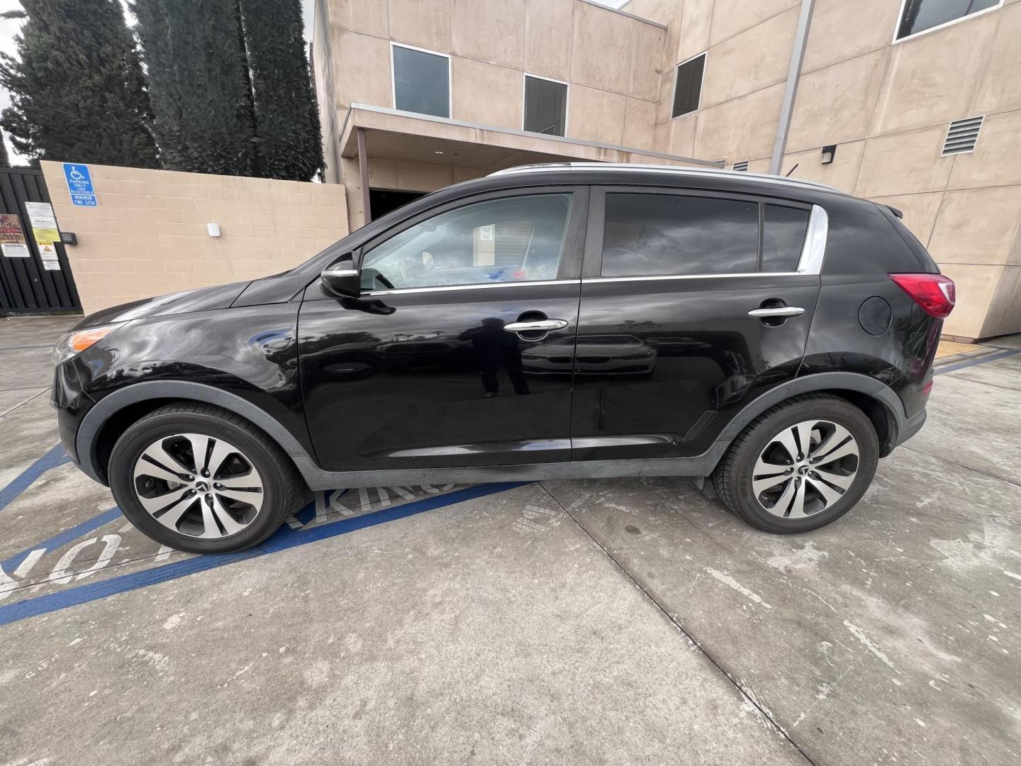 2013 Black /Black Kia Sportage EX FWD (KNDPC3A26D7) with an 2.4L V6 DOHC 24V engine, 6-Speed Automatic transmission, located at 30 S. Berkeley Avenue, Pasadena, CA, 91107, (626) 248-7567, 34.145447, -118.109398 - 2013 Kia Sportage EX FWD (VIN: KNDPC3A26D7404618) – A Reliable and Stylish Compact SUV If you’re in the market for a used compact SUV that blends style, reliability, and value, the 2013 Kia Sportage EX FWD (VIN: KNDPC3A26D7404618) deserves your attention. This well-crafted vehicle from Kia’s - Photo#2