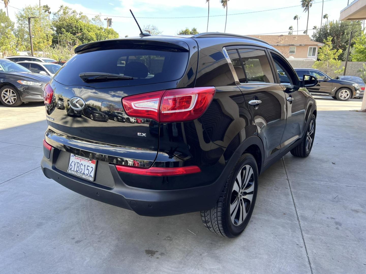 2013 Black /Black Kia Sportage EX FWD (KNDPC3A26D7) with an 2.4L V6 DOHC 24V engine, 6-Speed Automatic transmission, located at 30 S. Berkeley Avenue, Pasadena, CA, 91107, (626) 248-7567, 34.145447, -118.109398 - 2013 Kia Sportage EX FWD (VIN: KNDPC3A26D7404618) – A Reliable and Stylish Compact SUV If you’re in the market for a used compact SUV that blends style, reliability, and value, the 2013 Kia Sportage EX FWD (VIN: KNDPC3A26D7404618) deserves your attention. This well-crafted vehicle from Kia’s - Photo#22