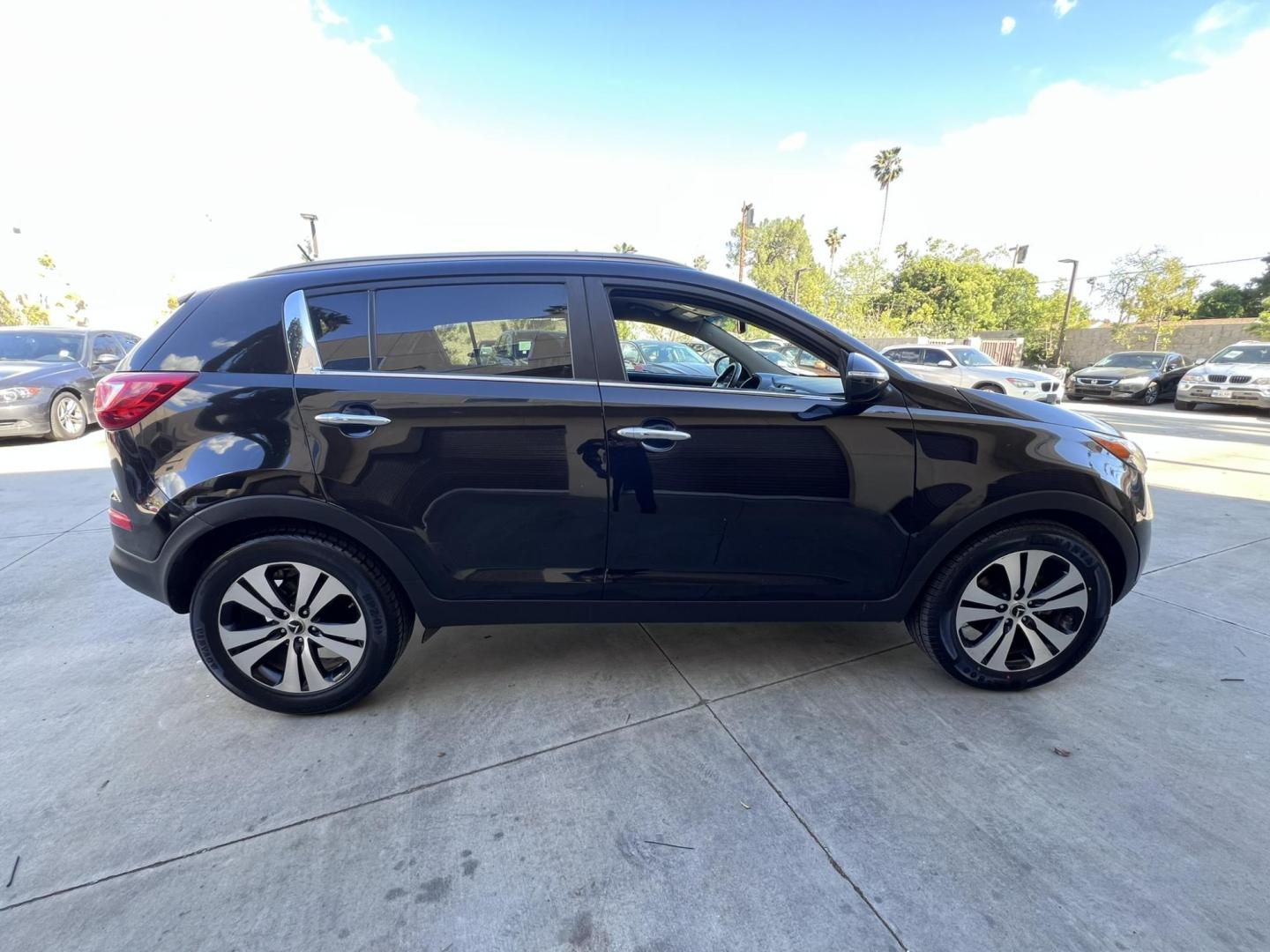 2013 Black /Black Kia Sportage EX FWD (KNDPC3A26D7) with an 2.4L V6 DOHC 24V engine, 6-Speed Automatic transmission, located at 30 S. Berkeley Avenue, Pasadena, CA, 91107, (626) 248-7567, 34.145447, -118.109398 - 2013 Kia Sportage EX FWD (VIN: KNDPC3A26D7404618) – A Reliable and Stylish Compact SUV If you’re in the market for a used compact SUV that blends style, reliability, and value, the 2013 Kia Sportage EX FWD (VIN: KNDPC3A26D7404618) deserves your attention. This well-crafted vehicle from Kia’s - Photo#6