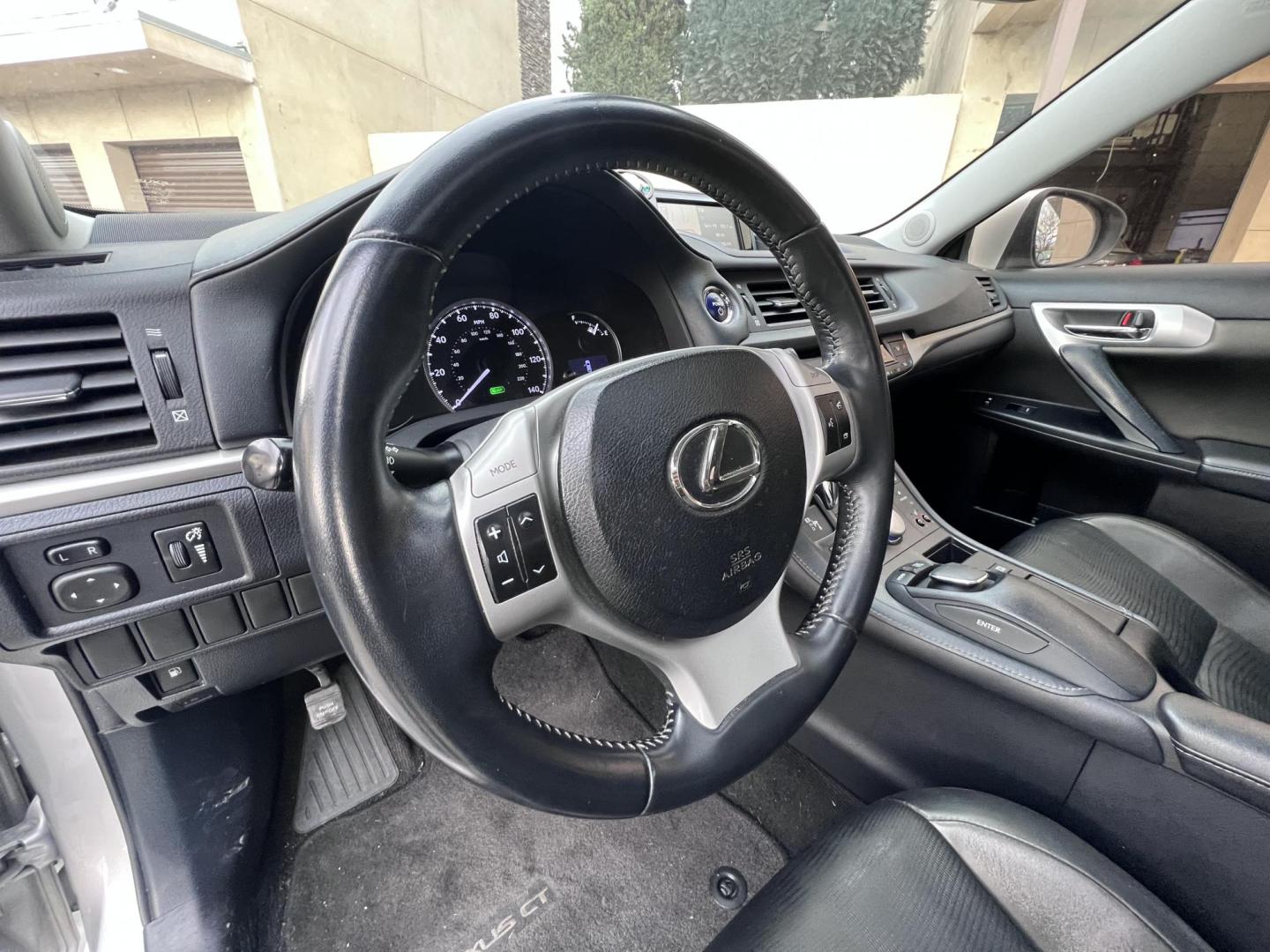2013 Silver Metallic /black Lexus CT 200h Base (JTHKD5BH1D2) with an 1.8L L4 HYBRID engine, Continuously Variable Transmission transmission, located at 30 S. Berkeley Avenue, Pasadena, CA, 91107, (626) 248-7567, 34.145447, -118.109398 - Crown City Motors is a used “Buy Here Pay Here” car dealer in Pasadena CA. “Buy Here Pay Here” financing, means that when you purchase your vehicle from our dealership, that you make the payments to the dealership as well. We do not need the banks approval to get you approved for a used auto - Photo#13