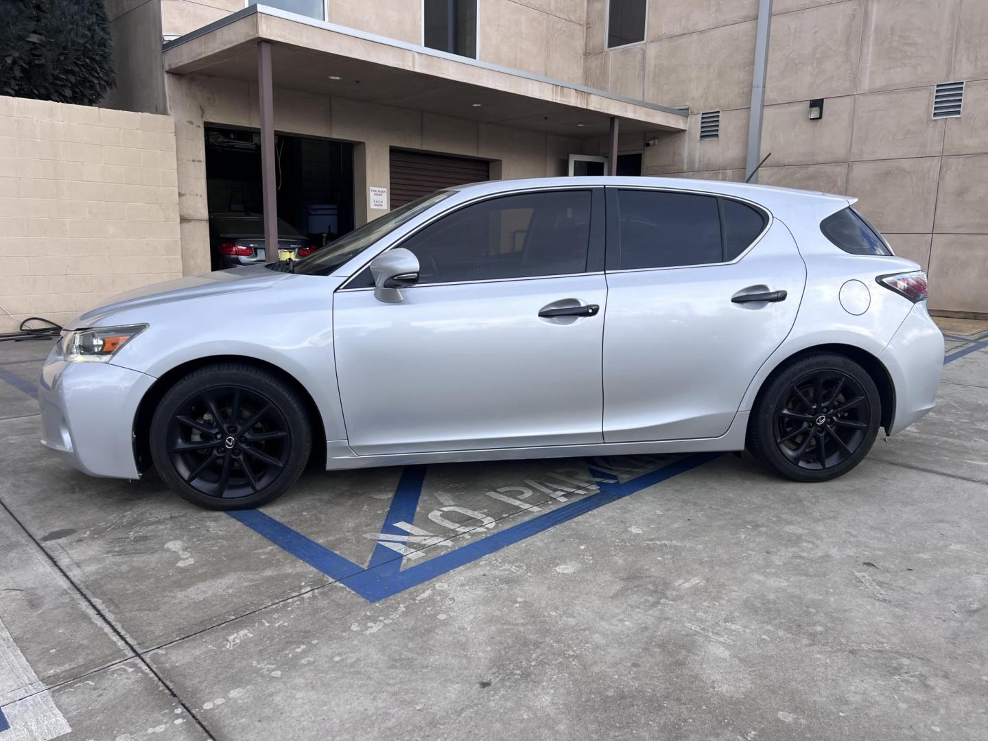 2013 Silver Metallic /black Lexus CT 200h Base (JTHKD5BH1D2) with an 1.8L L4 HYBRID engine, Continuously Variable Transmission transmission, located at 30 S. Berkeley Avenue, Pasadena, CA, 91107, (626) 248-7567, 34.145447, -118.109398 - Crown City Motors is a used “Buy Here Pay Here” car dealer in Pasadena CA. “Buy Here Pay Here” financing, means that when you purchase your vehicle from our dealership, that you make the payments to the dealership as well. We do not need the banks approval to get you approved for a used auto - Photo#2