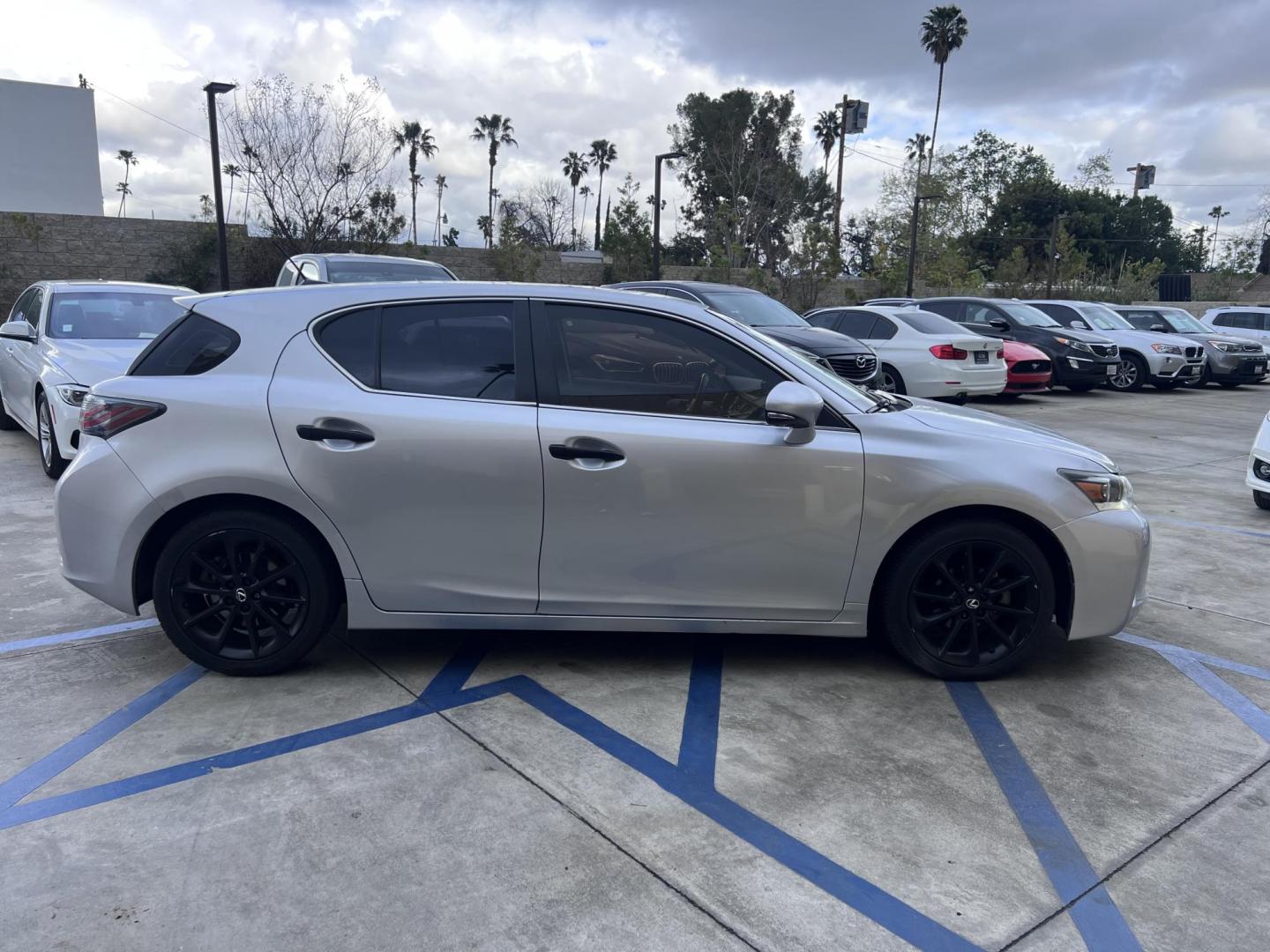 2013 Silver Metallic /black Lexus CT 200h Base (JTHKD5BH1D2) with an 1.8L L4 HYBRID engine, Continuously Variable Transmission transmission, located at 30 S. Berkeley Avenue, Pasadena, CA, 91107, (626) 248-7567, 34.145447, -118.109398 - Crown City Motors is a used “Buy Here Pay Here” car dealer in Pasadena CA. “Buy Here Pay Here” financing, means that when you purchase your vehicle from our dealership, that you make the payments to the dealership as well. We do not need the banks approval to get you approved for a used auto - Photo#4