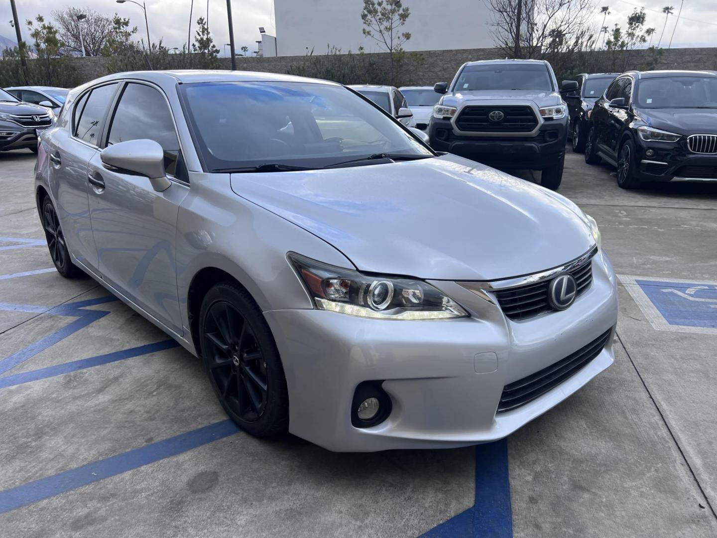 2013 Silver Metallic /black Lexus CT 200h Base (JTHKD5BH1D2) with an 1.8L L4 HYBRID engine, Continuously Variable Transmission transmission, located at 30 S. Berkeley Avenue, Pasadena, CA, 91107, (626) 248-7567, 34.145447, -118.109398 - Crown City Motors is a used “Buy Here Pay Here” car dealer in Pasadena CA. “Buy Here Pay Here” financing, means that when you purchase your vehicle from our dealership, that you make the payments to the dealership as well. We do not need the banks approval to get you approved for a used auto - Photo#5