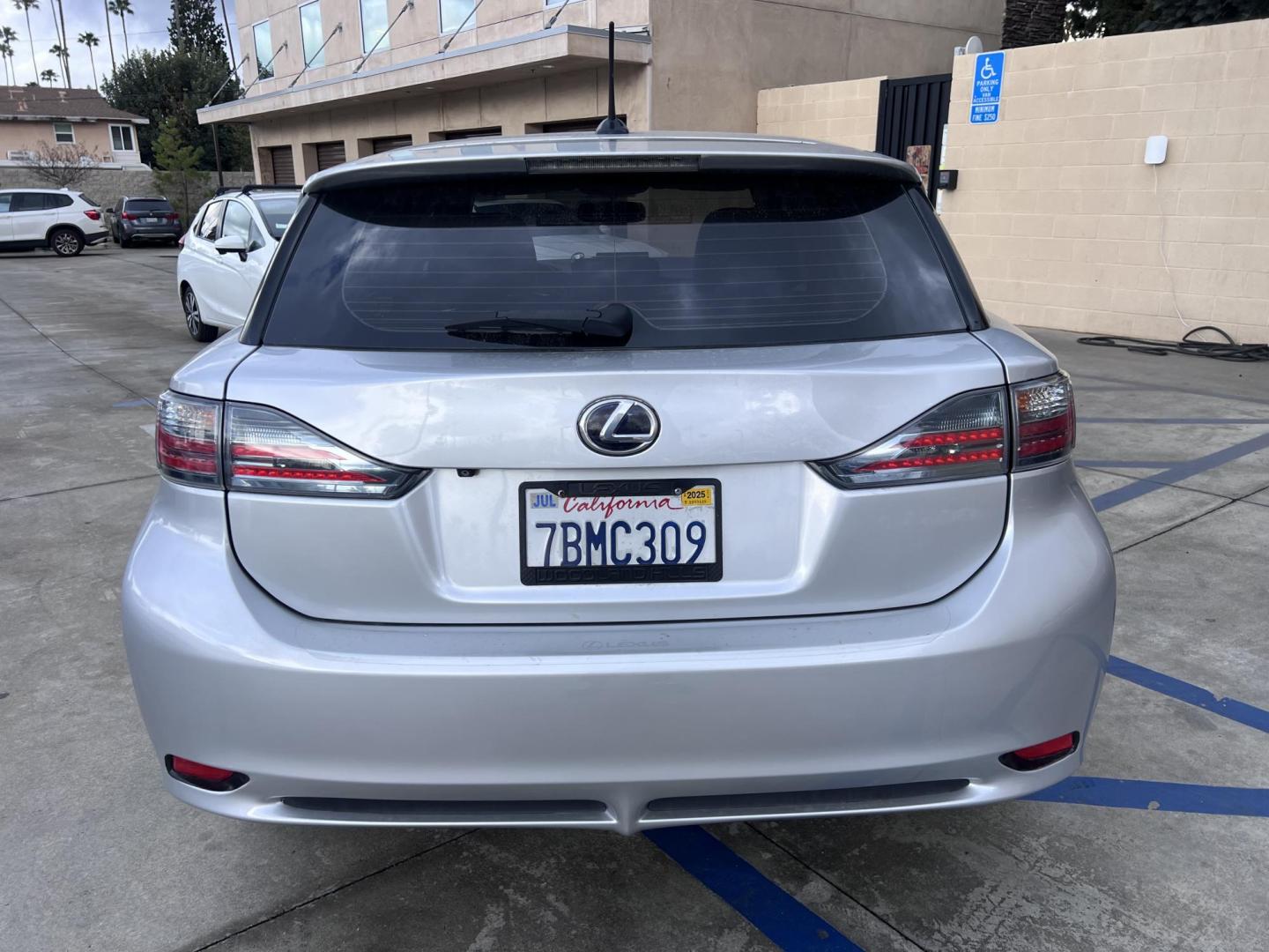 2013 Silver Metallic /black Lexus CT 200h Base (JTHKD5BH1D2) with an 1.8L L4 HYBRID engine, Continuously Variable Transmission transmission, located at 30 S. Berkeley Avenue, Pasadena, CA, 91107, (626) 248-7567, 34.145447, -118.109398 - Crown City Motors is a used “Buy Here Pay Here” car dealer in Pasadena CA. “Buy Here Pay Here” financing, means that when you purchase your vehicle from our dealership, that you make the payments to the dealership as well. We do not need the banks approval to get you approved for a used auto - Photo#7