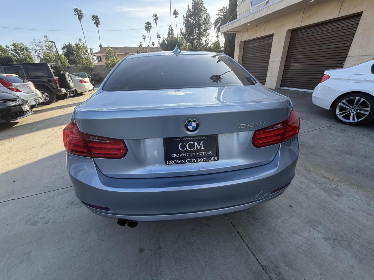 2013 BLUE /black leather BMW 3-Series 328i Sedan (WBA3A5C58DF) with an 2.0L L4 DOHC 16V engine, 8-Speed Automatic transmission, located at 30 S. Berkeley Avenue, Pasadena, CA, 91107, (626) 248-7567, 34.145447, -118.109398 - Looking for a luxurious and high-performing car that comes loaded with all the latest features? Look no further than the 2013 BMW 3-Series 328i Sedan, available at Crown City Motors. This stunning sedan is not only a head-turner on the road, but it also comes with all the latest features that you co - Photo#3