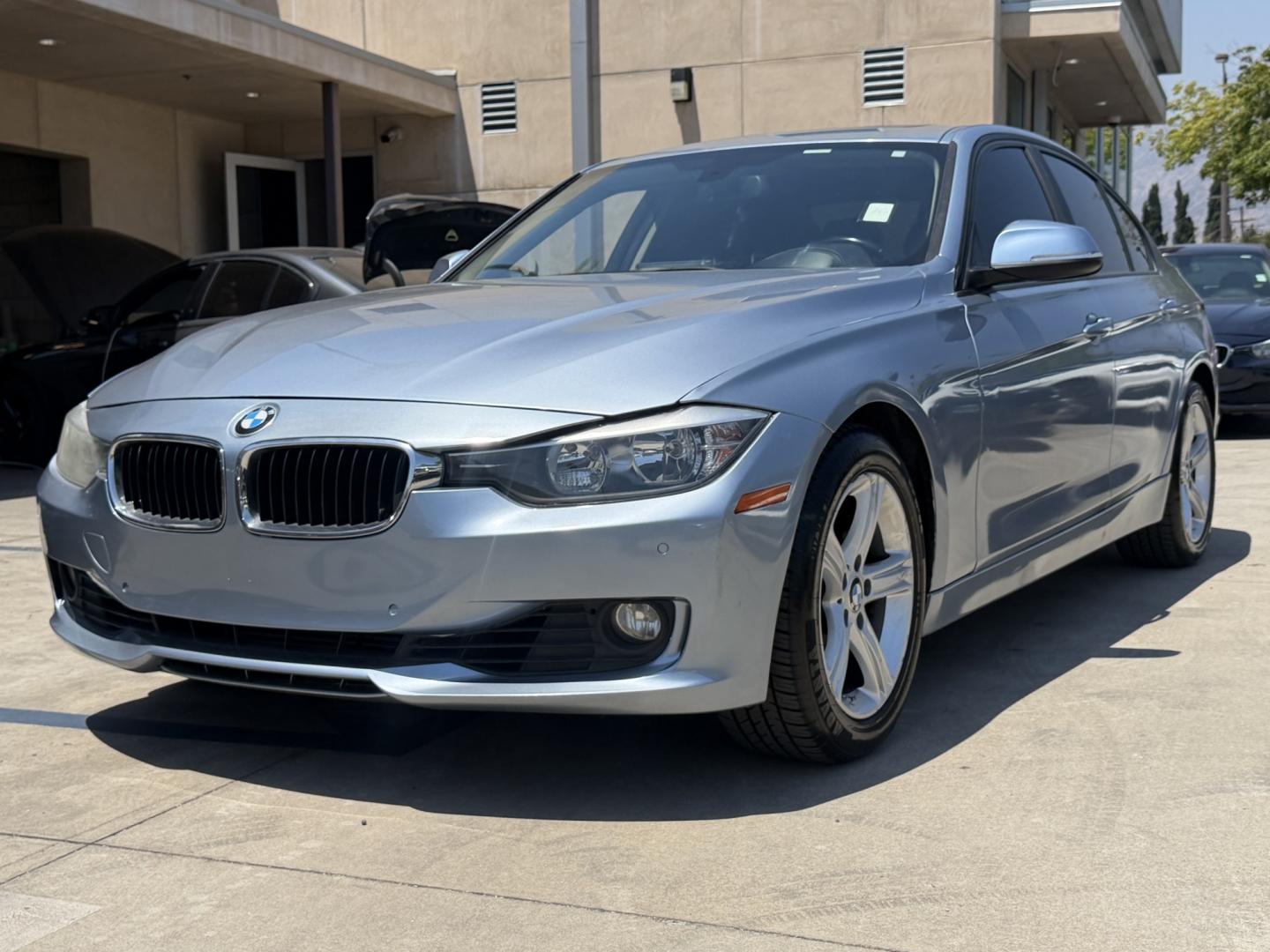 2013 BLUE /black leather BMW 3-Series 328i Sedan (WBA3A5C58DF) with an 2.0L L4 DOHC 16V engine, 8-Speed Automatic transmission, located at 30 S. Berkeley Avenue, Pasadena, CA, 91107, (626) 248-7567, 34.145447, -118.109398 - Looking for a luxurious and high-performing car that comes loaded with all the latest features? Look no further than the 2013 BMW 3-Series 328i Sedan, available at Crown City Motors. This stunning sedan is not only a head-turner on the road, but it also comes with all the latest features that you co - Photo#5