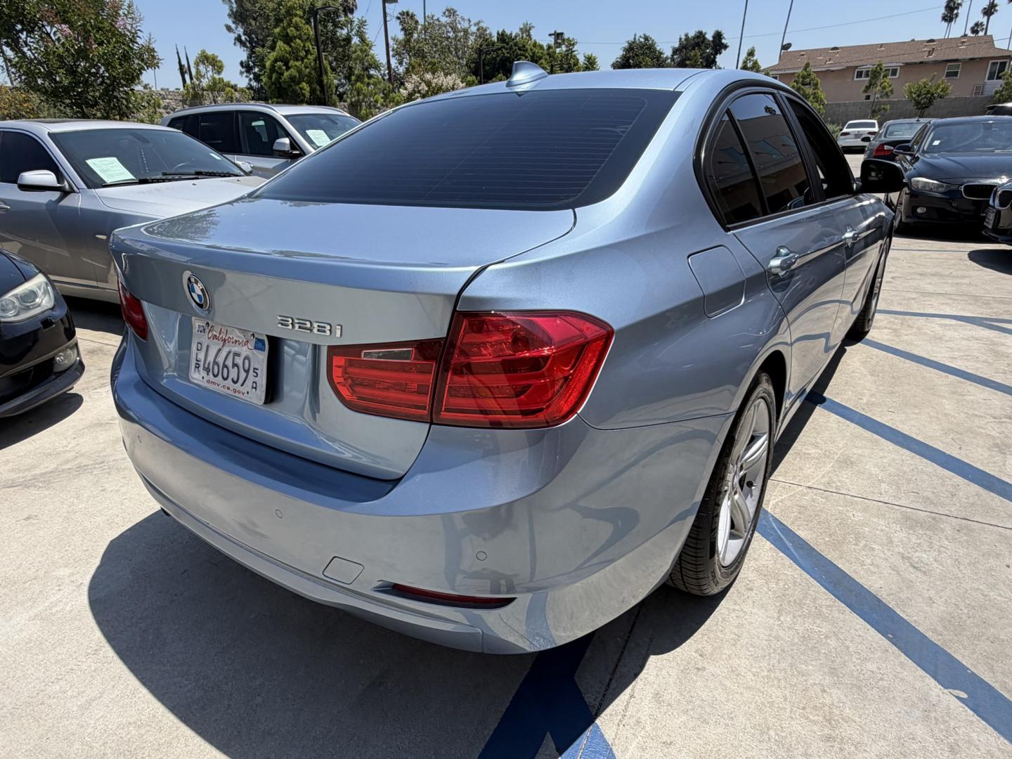 2013 BLUE /black leather BMW 3-Series 328i Sedan (WBA3A5C58DF) with an 2.0L L4 DOHC 16V engine, 8-Speed Automatic transmission, located at 30 S. Berkeley Avenue, Pasadena, CA, 91107, (626) 248-7567, 34.145447, -118.109398 - Looking for a luxurious and high-performing car that comes loaded with all the latest features? Look no further than the 2013 BMW 3-Series 328i Sedan, available at Crown City Motors. This stunning sedan is not only a head-turner on the road, but it also comes with all the latest features that you co - Photo#7